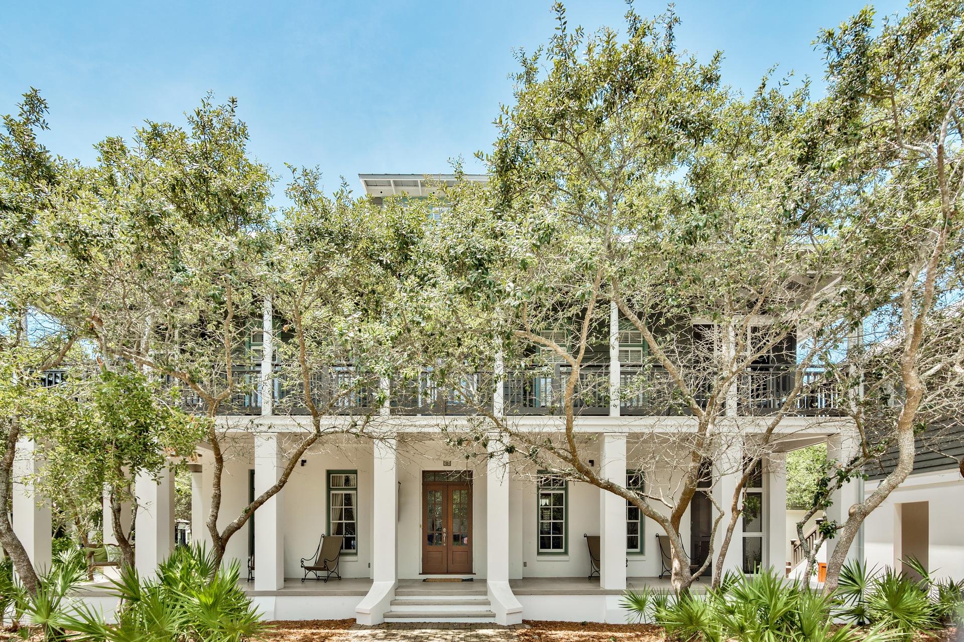 South side of 30A in Rosemary Beach gets no better than this! Professionally remodeled very recently, the home offers some Gulf views and the Coquina Pool is so close you'd think it was part of the property. The main house sits on a very large corner lot creating an abundance of privacy. The tranquil and well-landscaped outdoor space creates the perfect spot for a beverage or to star gaze. The separate carriage house Capiz Cottage (also remodeled) is one of the nicest you will see. It sits above the two-car carport and has a massive wrap around porch. In the main house, called Andalusia, the master bedroom suite is simply magnificent, again one of the finest you will see. The kitchen is a true chef's dream, just the perfect spot for entertaining. Bright, airy, and cheeryit overlooks