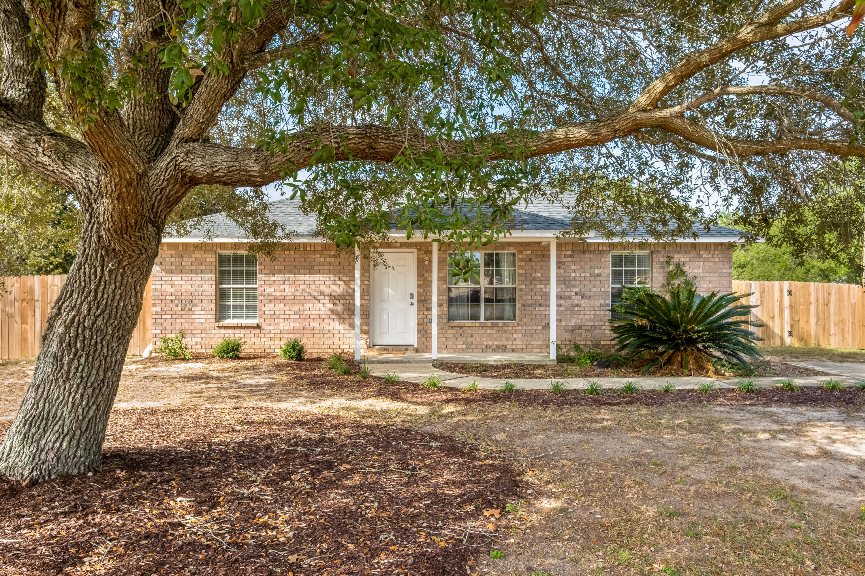 Charming 3-bedroom, 2-bath brick cottage in the heart of Midway, located within the highly sought-after Gulf Breeze A-rated school district. This well-maintained home features a modern kitchen with stainless steel appliances, granite countertops, and a bright, open layout. Enjoy tile and LVP flooring throughout--absolutely no carpet! The fenced backyard offers privacy and space to relax or entertain.Additional perks include HVAC air filter delivery, pest control, and lawn mowing provided by the owner. Pets may be considered with owner approval, a non-refundable pet fee, and monthly pet rent. Renter's liability insurance is required. No SMOKING. Home is occupied until Aug 6 2025. This home offers comfort, convenience, and thoughtful extras in a great location.