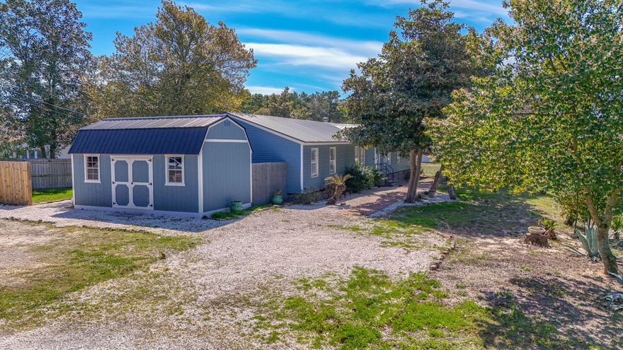 Don't miss this fantastic opportunity to own a spacious 4-bedroom, 2-bathroom home on the desirable west end of Panama City Beach! Situated on a corner lot, this home is just minutes from 30A, Pier Park, and the stunning Gulf beaches. Inside, the open kitchen features granite countertops, a built-in drawer microwave, double oven, and a pot filler. The cozy dining area is enhanced by a charming fireplace. The primary suite includes an en-suite bathroom, and there's also a versatile bonus room, perfect for a home office.Outside, you'll find plenty of parking for cars, a boat, or a golf carta"plus a 10x20 lofted barn and a garden shed for extra storage. Recent updates include a new HVAC unit, roof, hot water heater, and LVP flooring.  With no HOA and close access to Lake (SEE ADD. REMARKS) Powell's public boat launch, fishing, and swimming, this home is perfect as a primary residence or short-term rental. Schedule your showing today!