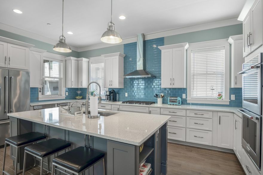 Set in an exceptional location close to Eastern Lake and beach access, this custom built beach cottage is hard to surpass. The condition of this home reflects the pride in ownership of the owner occupants who have never rented the home and the quality of Luke & Blue's construction. Inviting indoor and outdoor living space along with a fabulous chef's kitchen provide the perfect backdrop for making wonderful memories in your 30A home. Cooks and entertainers will appreciate the gourmet kitchen, which is filled with light from the windows and pendant lighting above the generous island. Above and beneath the quartz countertops, there is abundant storage. The stainless KitchenAid appliances include double ovens, a beverage refrigerator, ice maker and a five-burner gas cooktop. The dining area