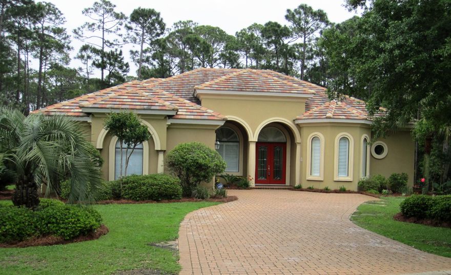 Welcome home! Luxury meets comfort in this Regatta Bay executive home. The home is situated in a cul-de-sac so you have maximum privacy. Inside the home you will notice that it looks brand new! The seller just had the interior of the home painted in a neutral color, and all the bedrooms have new carpet. The floor plan of the home is sure to please with a formal sitting room upon entry through the front door and formal dining room just beyond that. The kitchen and great room are conveniently tucked away at the back of the home. In fact, there is even a wet bar with wine chiller off the kitchen making it perfect for entertaining. The Master suite is stellar with a great view of the back yard. The master bedroom is quite large and features a beautiful tray ceiling.