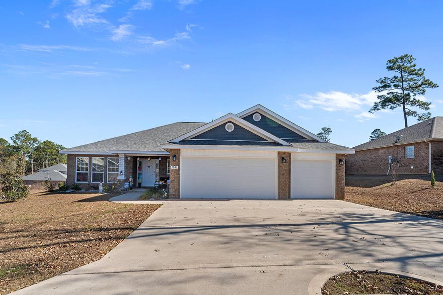 Welcome to 3041 Crown Creek Circle, an immaculate, fully furnished, and modern home in the established Brooke Estates community of Crestview.  Built by Whitworth Builders in 2023, this spacious 4-bedroom, 3-bathroom residence offers 2,540 sq. ft. of meticulously designed living space, perfect for those seeking comfort, style, and function.The home boasts an open, light-filled floor plan with high ceilings, including elegant tray and coffered ceilings, that connect the main living areas seamlessly. A desired split-bedroom design ensures privacy for the primary suite.The heart of the home features a large island, granite countertops, a dedicated pantry, and a suite of stainless-steel appliances, ideal for both casual family meals and entertaining. Retreat to the expansive primary bedroom, featuring dual walk-in closets and a spa-like ensuite bathroom. The master bath is a highlight, offering a signature zero-entry, all-tile walk-in shower and a separate soaking tub.

Enjoy the durability and aesthetic appeal of luxury wood-look vinyl plank flooring throughout the main living and wet areas. The home was constructed with durable 2x6 exterior walls for enhanced energy efficiency and structural integrity.

Step outside to a covered rear lanai, perfect for enjoying the Florida weather, overlooking the spacious 0.30-acre lot. A new fenced in backyard with five different types of fruit trees (Pear, Peach x 2, Lemon, Lime and Fig) along with an installed sprinkler system makes this yard an oasis for your pleasure and enjoyment.

Additionally, a highly sought-after 3-car garage provides ample space for vehicles and storage. 

The property is part of a community with a low monthly HOA fee.
The home is furnished and the furnishings can convey to the Buyer at no value.