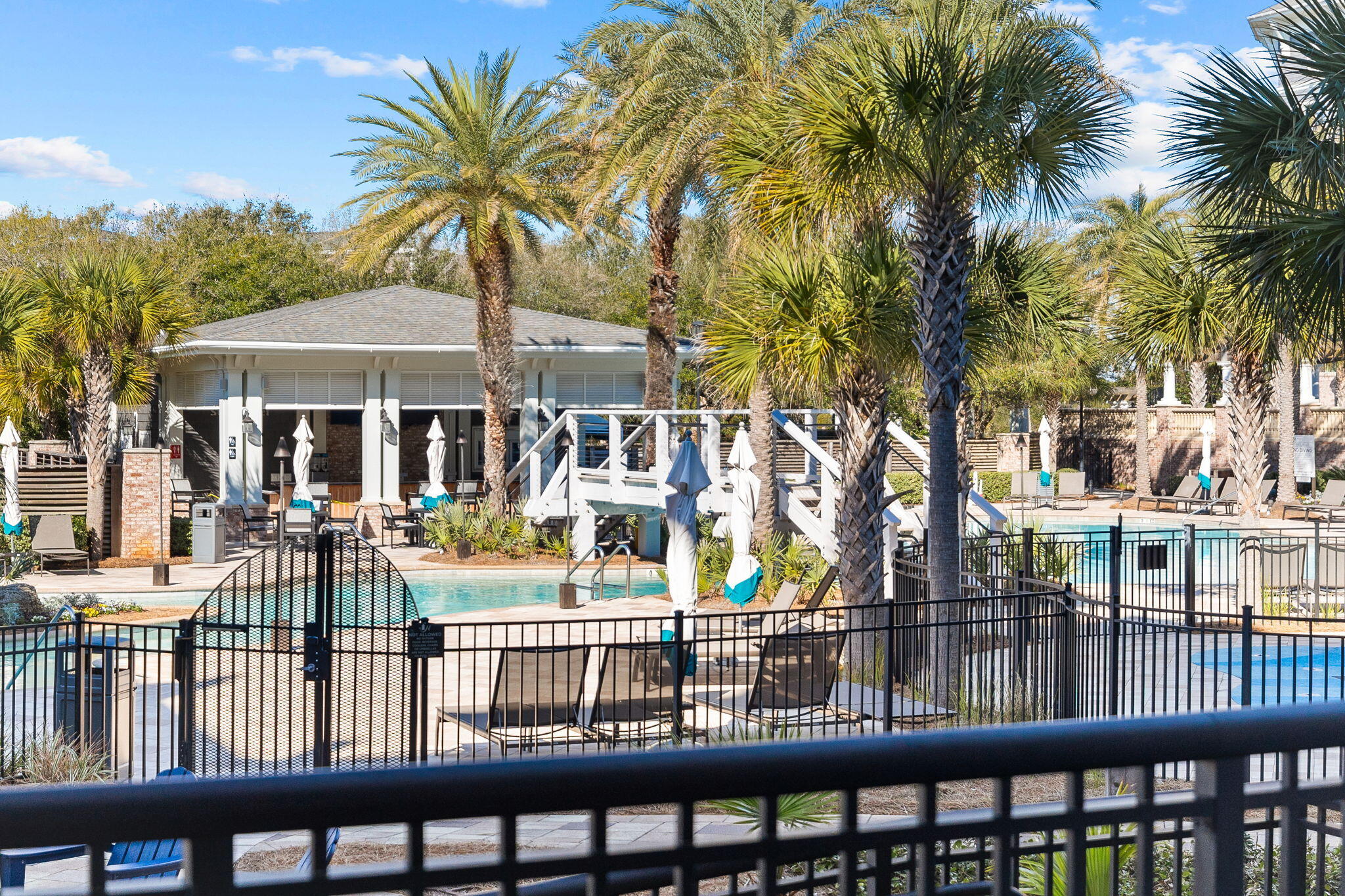 RENTAL MACHINE! $90,000 in Gross RENTALS in 2023! Don't miss your opportunity to purchase a highly sought after 1st floor walkout unit. With balcony access directly to the pool, this unit is one of the best rentals in the building. The Henderson Lofts are a part of, and share amenities with Destin's most luxurious resort, The Henderson Beach Resort. With this partnership, world class amenities are available to you and your guests. These include THREE POOLS!, (two family pools with lazy rivers & an adult only pool), PRIVATE beach access, private beach club, TWO poolside bar & grills, on-site fine dining, a fitness center, and ROOM SERVICE just to name a few. This is truly a luxurious vacation destination. Take a look today.