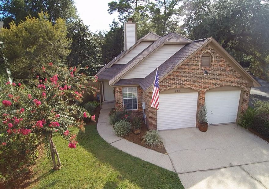 Comfortable 2bed/2bath home located on low-maintenance lot in desirable Bluewater Bay neighborhood! Roof replaced in 2014 exterior painted in 2015! Open floor-plan with tile and hardwood flooring, living area and kitchen separated by breakfast bar. Newer French doors from dining area lead out to lovely landscaped back yard with privacy fence. Kitchen outfitted with stainless appliances and counter-tops as well as updated cabinetry and lighting. Spacious carpeted bedrooms. Enclosed garage with walk-in storage room. Home is in a great location, close to Bluewater Elementary School, shopping, restaurants, recreation; and just a short drive to Eglin AFB, schools, hospitals, and Destin shopping & beaches! Schedule a showing today!