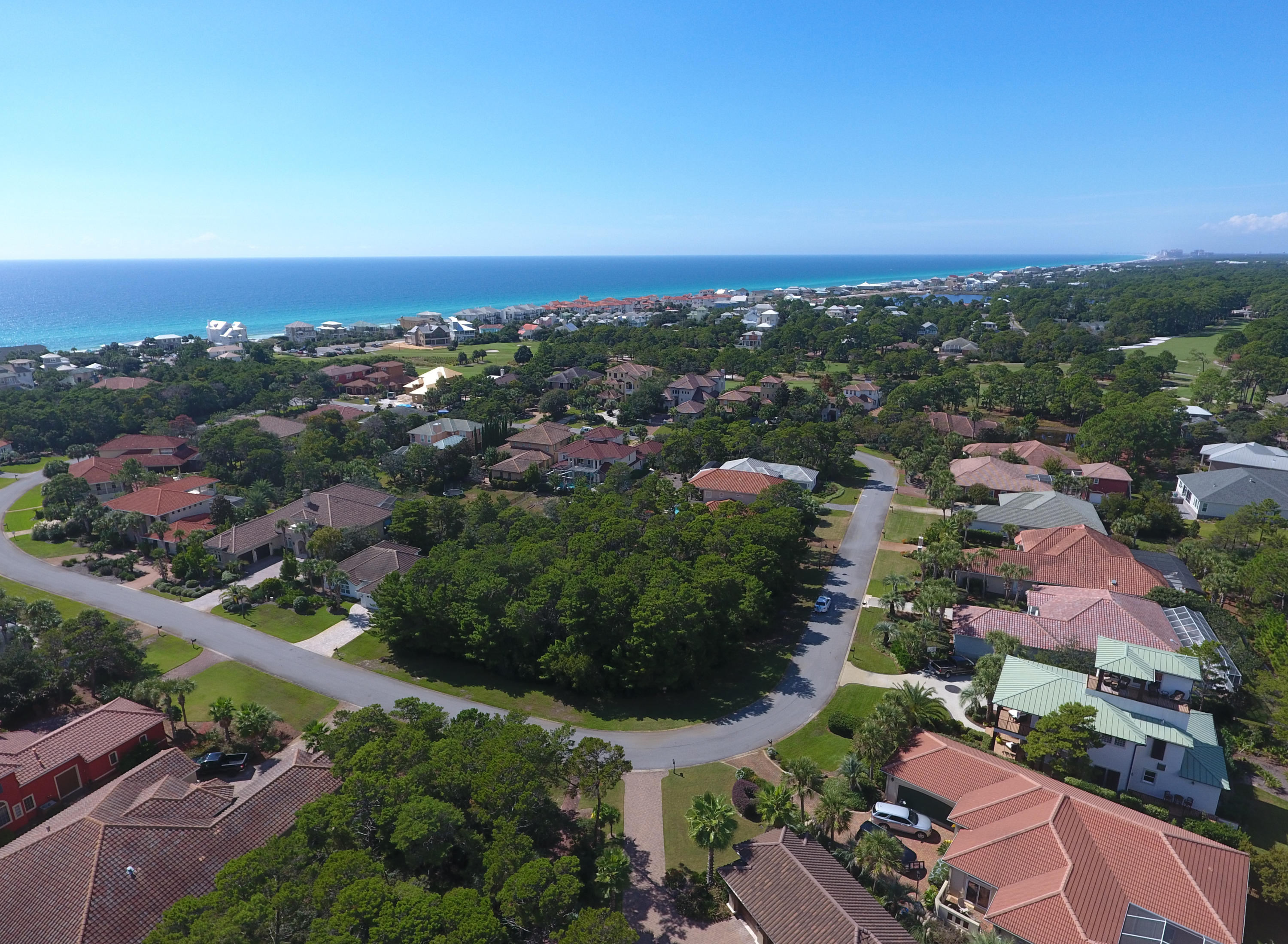 Build on this perfect .27 acre corner lot in this popular 30A community known for it's grace and elegance or hold in your portfolio. BellaMar at Gulf Place is inspired by the renowned Florida coastal region Mediterranean Style Home (also, known as Spanish Colonial) an architectural design that was first introduced to the United States in the earlier part of the 19th century.With the rental limitations and gated community, you're offered additional privacy and security throughout the year! BellaMar offers large lots, matching features, decorative signs, beautiful landscapes, walking paths throughout the community and all the amenities of Gulf Place Town Center, from dining, shopping, amphitheater entertainment and more. Santa Rosa Golf & Beach Club offers memberships for golf and