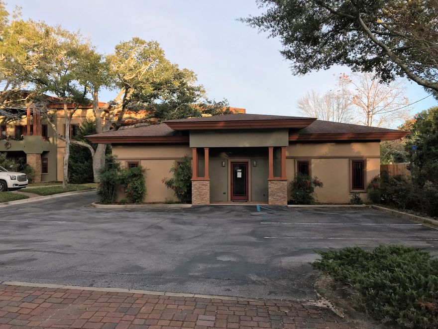 This beautiful, updated office space is perfect for any professional service business looking for a mix of private offices and open studio space. Featuring a lobby, two private offices, an executive office with attached private full bathroom, break/copy room, individual male and female restrooms (both handicap accessible) and a large, open studio space with some built-in desks and room for more. Owner will pay taxes and insurances, lessee will pay utilities. There are four back rooms currently used as storage by the owner - owner reserves the right to access these rooms as needed during and after business hours (see photo showing delineation of rent-able space).