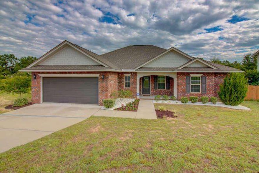 This sweet 4 bedroom 2.5 bath home is located in in a quite neighborhood convenient to both HWY 85 and HWY 285. Hardwood floors flow through the large living room. The kitchen is open to the living room and features generous storage, breakfast bar and granite. Through the back door you'll find a covered patio and deck perfect for grilling and a private backyard. The lovely master suite is spacious with the master bath boasting a walk in closet, double vanity, shower and sperate tub. Come see all this home has to offer.