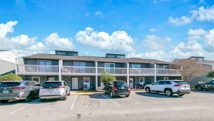 BACK ON MARKET!! Price slashed! - King Kong Deal! By far the lowest priced townhome on the market in Destin. New roof 2017. According to Association manager, Destin Racquet Club HOA is responsible for landscaping, irrigation, pool, roofs, exterior siding and balconies. Will make a great renal investment! Located in the heart of Destin, this property offers convenient access to shopping, golf courses, schools, restaurants, medical facilities, and, of course, the Gulf and beaches. Upstairs, you'll find two spacious bedrooms, each with its own full bathroom and a private balcony. The community also boasts a pool for residents' enjoyment.