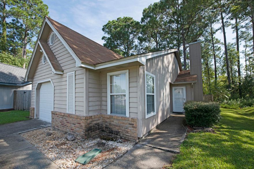 Cute home in the heart of Fort Walton Beach! This home features a great open and split bedroom floorplan. Inside the home you will also find a nicely sized eat-in area and breakfast bar in the kitchen. The kitchen overlooks the living room, which boasts a cozy fireplace. Another great feature of this home is the large backyard, so you can have plenty of room for pets and outdoor activities! *Square footage includes inside laundry not included in square feet--