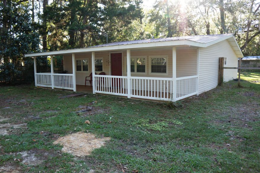 Moving into this house will make the owner a part of the strong McDaniels Fish Camp community, where neighbors help neighbors and fish frys where all are welcome are common. If fishing and relaxing go together in your mind, then this adorable home will have you asking, ''Is this Heaven?''