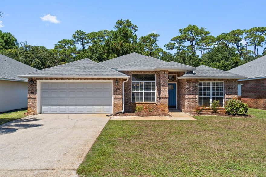 Welcome to this updated and move in ready all brick 4 bedroom/2 bath home just minutes to Hurlburt Field in the quaint and gated community of Cobia Bay!  From the moment you step through the craftsman style front door you will be impressed. The dining room sits at the front of the home and has an oversized transom window that allows natural light to fill the home and you'll love the luxury vinyl plank flooring that extends throughout the common areas. The oversized front bedroom is opposite of the dining room and has double French doors which makes it perfect for an office or flex space to suit your needs! The kitchen is situated at the center of the home and has been tastefully updated with all the finishes you're looking for. The kitchen faces the spacious living room where you'll find a tray ceiling and cozy gas fireplace surrounded by updated tile. It also has a great view looking out over the backyard to the private green space area behind the home. The backyard is a fully fenced in space adorned with a pergola that extends the length of the large 27.2x10 backyard patio where you'll love spending time! The master bedroom is a large space to enjoy with its own access to the back patio and quite large and has a great view and access to the patio. You're going to fall in love with the renovated master bathroom complete with TWO walk in closets, a soaking tub, double vanities, and a walk in shower. In fact, both bathrooms have been extensively updated with new floors, cabinets, tile, toilets, sinks, and tiled showers! Have peace of mind with a 2025 water heater and roof and HVAC installed in 2018, and the home is located in X so no flood insurance is required.
