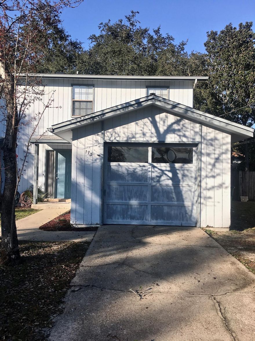 Why rent when you can buy?! Enjoy the benefits of home ownership and pay less to own! This end unit townhome is only minutes from Eglin AFB and close to shopping, schools and restaurants. The downstairs has ceramic tile throughout with built-in shelving in the great room. There is a breakfast bar with separate dining area that is open to the great room. A half bath is located downstairs. Upstairs there are two master bedrooms with walk in closets and they each have separate vanities and share an adjoining bath. There is an open deck that looks out to the private backyard with beautiful shade trees. Brand new dimensional shingle roof installed March 2019