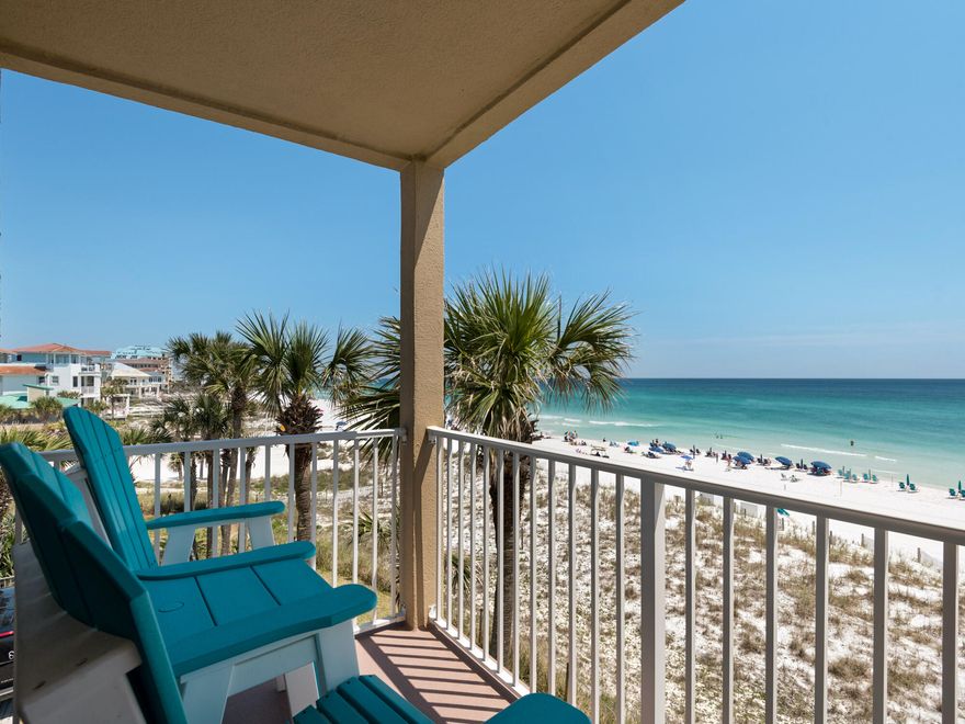 Freshly Painted 12-13-24!! This great east end corner unit with breathtaking views of the beautiful emerald green Gulf waters is located in the desirable Crystal Beach area. Emerald Dunes is a gated Gulf Front, low density complex featuring pool, hot tub, grilling area & elevator. This two bedroom/two bath condo has an open floor plan which allows for gulf views from the kitchen, dining area & living room. Unit has tile floors throughout. Kitchen boasts mosaic tile backsplashes & a free standing ice machine. water heater, ice machine replaced in 4/2022 , new dishwasher installed in 1/2024., washer/dryer 8/2024. Located on the west end of Scenic Highway 98, this property is within walking/biking distance of local shops & restaurants. Call today to make this piece of paradise