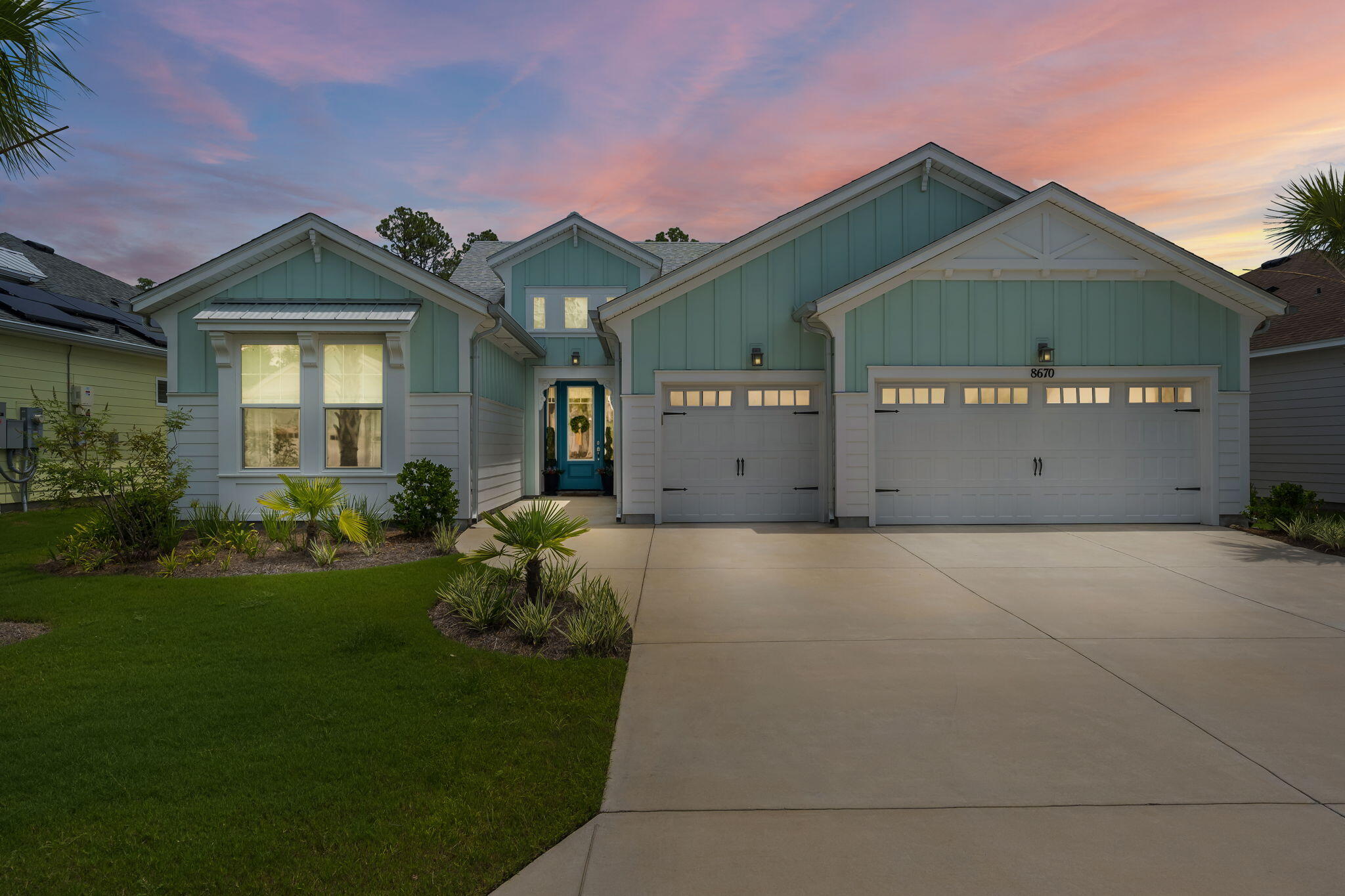 Step into luxury and coastal elegance with this stunning Trinidad model in Phase 4 of Latitude Margaritaville Watersound, where every detail has been thoughtfully designed to create a sophisticated yet relaxed atmosphere. Imagine your life in this expansive Island Collection home featuring a 3 car garage and breathtaking views of a serene nature preserve, all just a quick golf cart ride from the vibrant Town Center overlooking the picturesque Intracoastal Waterway. As you approach the residence, the welcoming glass front door invites you in, revealing a beautifully appointed interior bathed in natural light. The custom light-filtering shades throughout the home add a touch of style while allowing for privacy and brightness. The open-concept living spaces are enhanced by laminate flooring that exudes warmth and charm, complemented by a fresh coat of Reserve White paint that sets an elegant tone. The heart of this home is undoubtedly the gourmet kitchen, where culinary dreams come to life. With striking L3 Minuet Quartz countertops and L2 Glacier Gray cabinets, this space is both functional and fabulous. Enjoy the convenience of a single wall oven, electric cooktop, and ample storage, including a double glass cabinet for displaying your finest china. Under-cabinet lighting and pendant fixtures over the island create an inviting ambiance, perfect for entertaining friends and family. Retreat to the family room, where a gas fireplace framed by marble surround creates an inviting focal point. Here, recessed and dimmable LED lighting, along with custom blackout window treatments, ensure comfort and luxury at any time of day. The private den, with its French doors and CAT6 jacks, offers the perfect space for a home office or cozy reading nook. The primary bedroom suite is a true sanctuary, featuring two built-in closet systems that provide ample storage, while the en-suite bathroom boasts a seamless shower enclosure, a luxurious garden soaking tub, and elegant Moen fixtures. With high-end finishes like L1 Luna Pearl granite countertops and soft-close toilet lids, every detail has been carefully curated for your comfort. Each of the additional bedrooms features en-suite bathrooms, ensuring privacy for family and guests alike. Custom blackout window treatments and natural woven shades add an extra layer of elegance, while the thoughtful inclusion of Waterpik shower heads promises a spa-like experience. The laundry room is a dream come true, equipped with custom built-in cabinets, a stylish butcher block countertop, and even a beverage cooler for those warm days. A dedicated shoe holder with a bench makes it easy to keep things organized. Finally, step outside to the screened paver lanai where an outdoor ceiling fan creates the perfect atmosphere for enjoying tranquil evenings surrounded by nature. With a whole house generator and gutters, this home is not just beautiful but practical as well. Don't miss the opportunity to make this luxurious sanctuary your own. Experience coastal living at its finest in this stunning Latitude Margaritaville Watersound home, where every moment feels like a celebration.