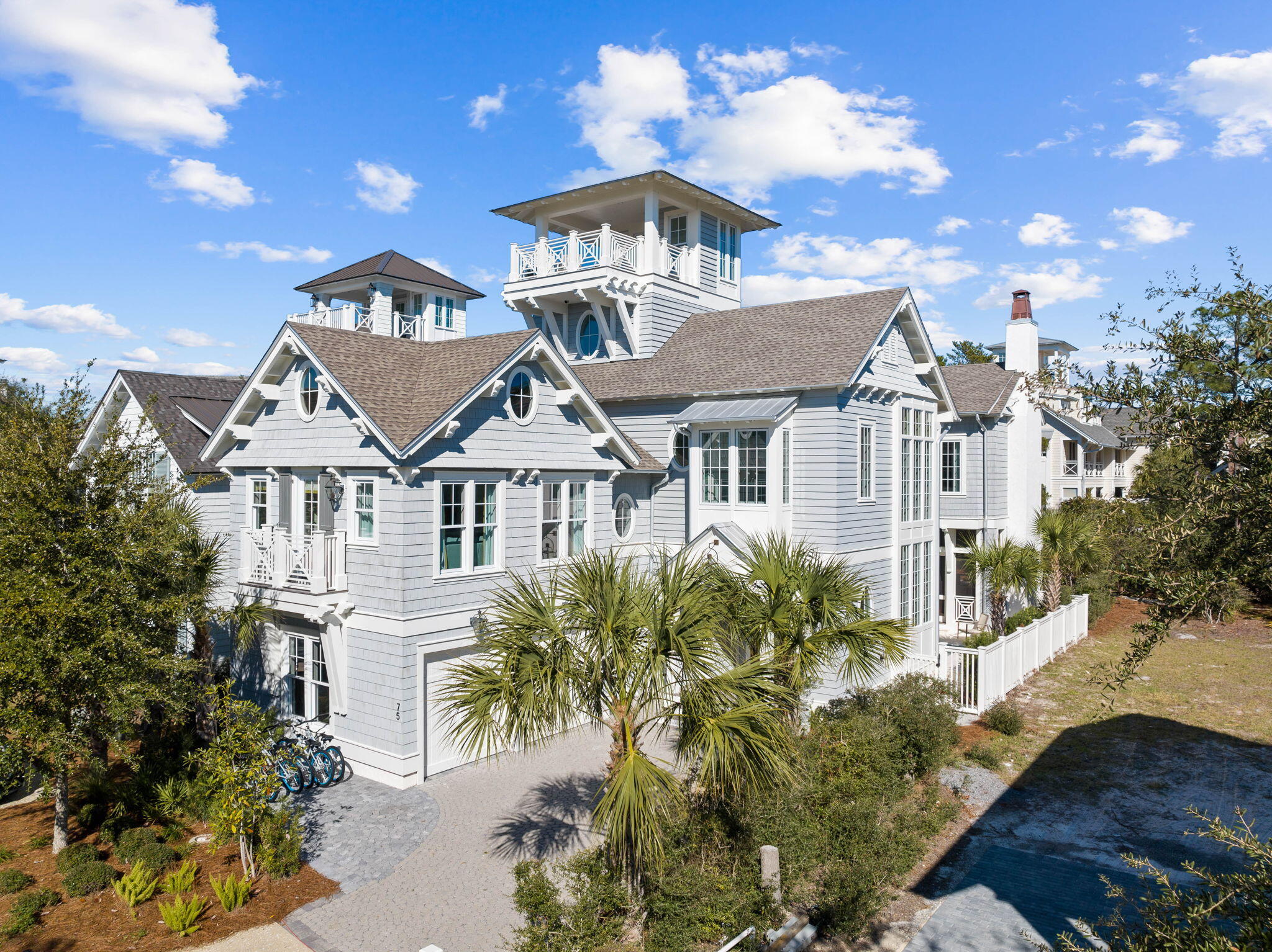 Located behind the private gates of Watersound Beach, this picturesque residence boasts over 4,200 square feet of thoughtfully designed living space bordered by lush vegetation and covetable Gulf views. A true icon of craftsmanship executed by the sought after architect, T.S. Adams.Upon entering the foyer you are immediately greeted with natural sunlight. The Chef's kitchen features custom cabinetry, an oversized island, and top of the line appliances. Step outside and enter a world of your own: outdoor living area synonymous with relaxation include a screened-in porch, outdoor fireplace, and pool. The sumptuous primary suite engulfed with natural light features a luxurious bathroom with double vanity outfitted in pecky cypress, soaking tub, and custom tiled shower. An additional living space and bunk room complete the second floor. Retreat to the lookout tower to enjoy gulf views.

Watersound Beach resides on 1,400 acres and over a mile of private white sugar sand beaches. The culmination of amenities and exclusiveness affords residents with the epitome of private coastal living while remaining geographically poised near the world-class dining and entertainment venues 30A has to offer. 75 Compass Point is a rare and special residence to be cherished by discerning owners for years to come- inquire today to schedule a private viewing.