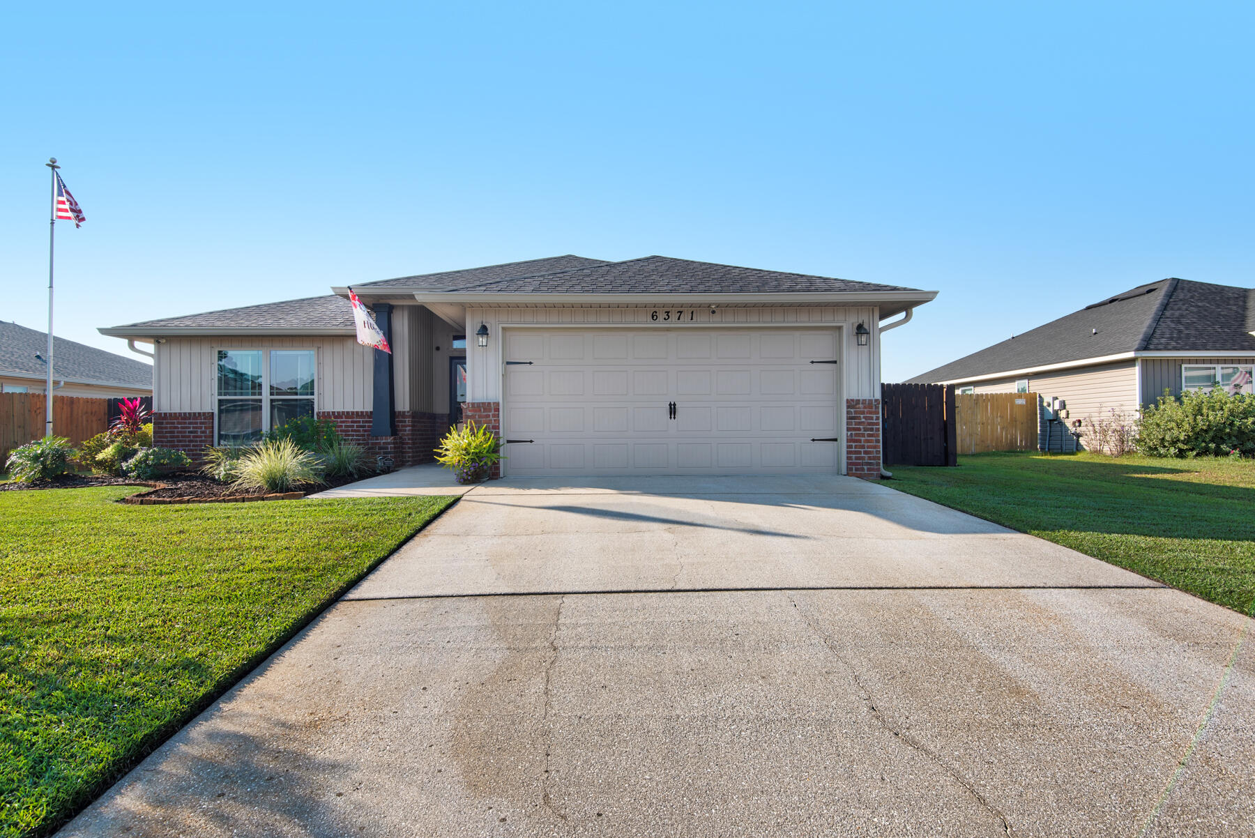 Better than new! Well maintained and thoughtfully updated since day 1! Fresh paint throughout in 2023.The beautiful kitchen features granite counters and breakfast bar, stainless appliances, and ample cabinetry, and it's enhanced by Alexa controlled lighting.Wood-look LVP throughout the home. Master bath features a tiled shower, soaking tub, and HUGE walk-in closet.Enjoy the beauty of the backyard oasis, complete with detached storage building. Catch a game from the expanded and screened lanai, with retractable screen on the French doors.Coolest garage ever! Plenty of wall-mounted cabinetry, TV on swivel wall-mount, 12K BTU mini-split HVAC, and insulated roll-up door that is also Alexa controllable.There's so much more to see. Schedule your showing today!