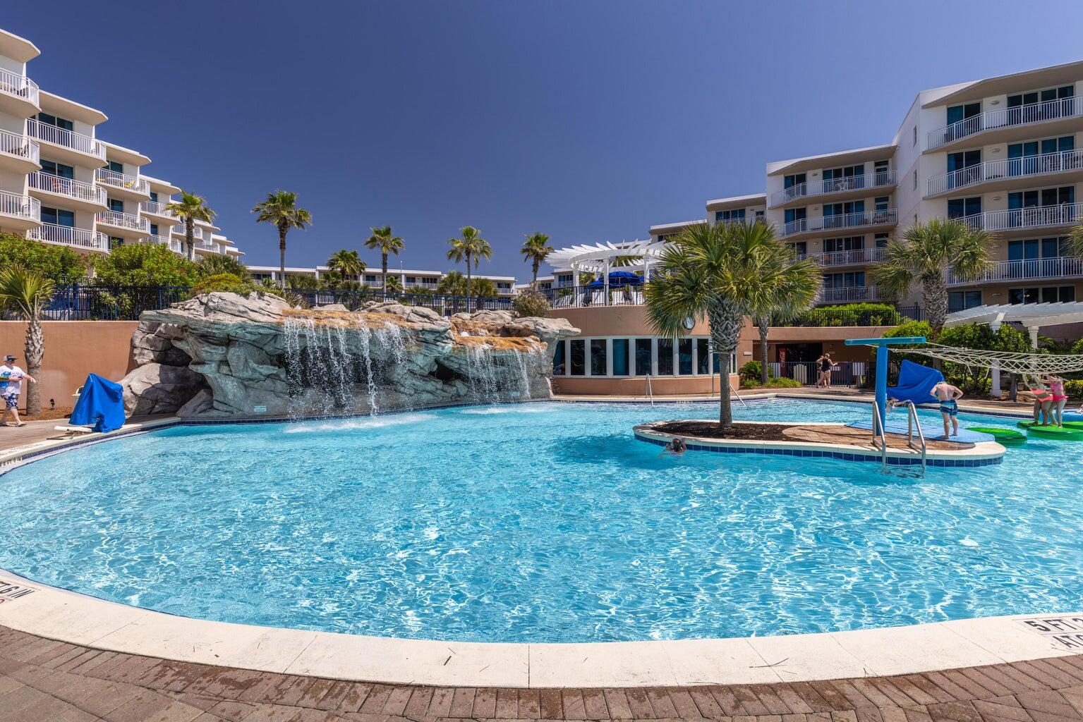 Waterscape! the Emerald Coast's favorite Beach Front Resort!  Rare opportunity to purchase this Courtyard facing unit! This spacious 1,292 sq ft condo sleeps 8 comfortably and boasts 2 bedrooms + bunk room and 2-1/2 baths. Interior features include low maintenance tile including wood look tile flooring, stainless appliances, granite kitchen counter tops, 8' 10'' ceilings, crown molding, beautifully furnished, luxurious baths w soaking tubs and huge separate showers, 8' deep, over sized balcony w/ access from the living area, master bedroom and guest bedroom. Waterscape amenities include a fabulous courtyard, featuring two levels of pools( one heated),toddler play park, Lazy River, Waterfall, numerous gas grills, located on both pool decks, tiki hut bar & grill, fitness center, beach -  outdoor showers, handicap accessibility, covered parking garage, pet stations ( pets allowed for owners only) 24 / 7 on-site security, on-site rental desk and best of all 490' of Gulf front Beach access!