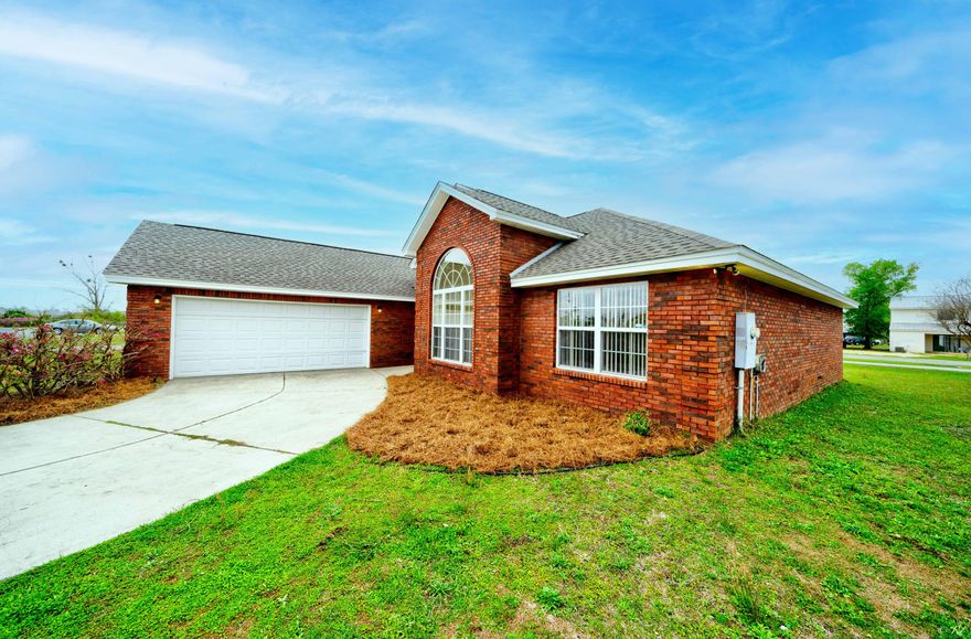 3 bed, 2 bath brick home in the peaceful Forest Walk neighborhood. This home boasts a large living room with 12' ceilings featuring recessed lighting and crown molding, an electric fireplace and double doors that lead to the covered back porch. The eat-in kitchen features stainless appliances, a breakfast bar, plenty of cabinets for storage, and a pantry. There is also a formal dining room featuring a beautiful chandelier and a large arched window. This home features a split bedroom floorplan, offering plenty of peace and privacy. The spacious primary bedroom will wow you with tray ceilings, recessed lighting and large private ensuite. The primary bathroom boasts a jetted tub, separate surround tile shower with a glass door, double vanity and a large walk-in closet!