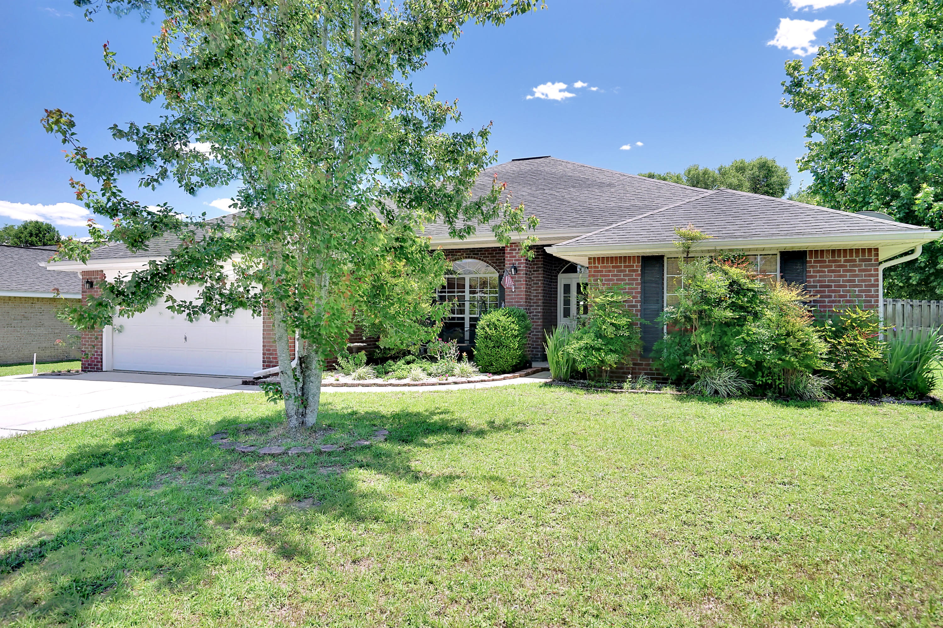 This 4 bedrooms, 2 full baths, Brick Ranch Estate is your neighborhood dream with a getaway in the backyard that feels like you're living in the country! Experience the joy of your beautiful neighborhood from the front and enjoy the lovely, country feeling and relaxing backyard that joins up close to the Yellow River Preserve on a corner lot! This home is the ultimate neighborhood, city and country living mix all in one! All stainless steel, American-made (Maytag(TM)) appliances embrace the kitchen and 2,320 sq/ft of living space, some with cathedral ceilings, await your comfortable living! Bonus screened-in back porch and patio area are perfect for entertaining, grilling and relaxing! Cleo Park is right at the end of the street. Find a Video Tour at https://youtu.be/DBXzzTIm6E