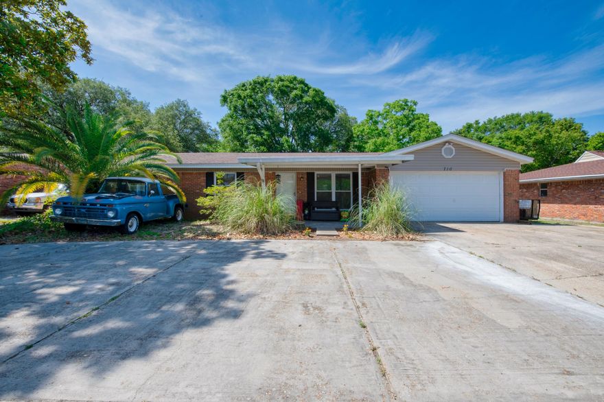 Located directly in the heart of Fort Walton Beach & Mary Esther, comes this charming 4 bedroom 2 bathroom home on Hollywood Blvd! This home presents with TONS of value for the money. Not only do you have a large fenced private yard great for animals, but a 2 car garage, a boat/ RV pad, and two additional parking pads for all of the toys. Inside the home, you'll enjoy fresh paint throughout, and a massive kitchen full of natural light. A quaint living space gives way to 4 bedrooms, including nearly a 300 square foot master bedroom. Rest easy with a 2019 Rheem HVAC unit throughout, coded pad locks on front and back doors for overall security. Come get this immense value property that is barely minutes from everything that makes Ft Walton wonderful, before it is gone!