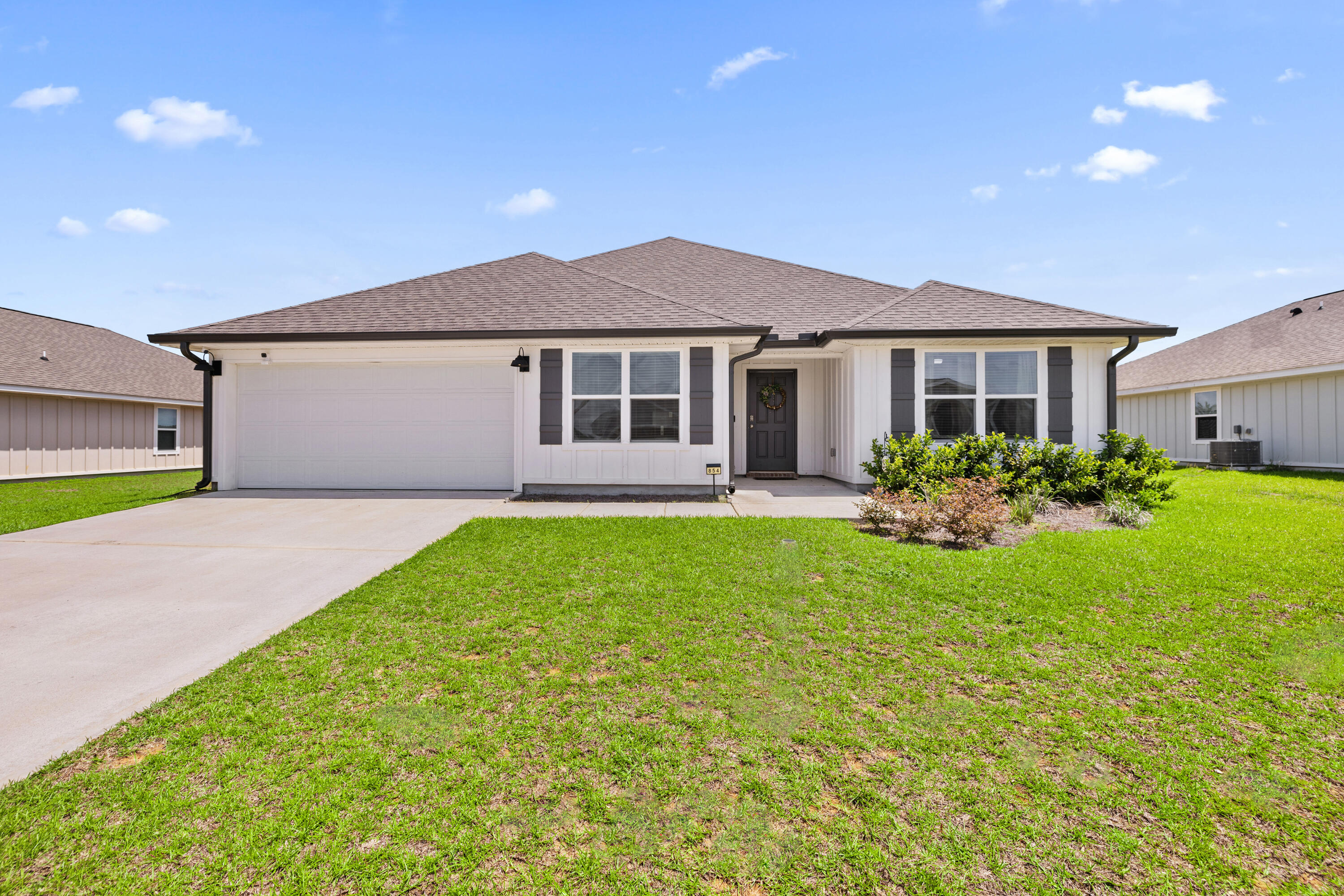Welcome to your dream rental in the sought after southern Crestview area in the Shoal River Landing neighborhood. This spacious 5-bedroom, 3-bathroom home offers nearly 2,500 square feet of modern living in a beautifully designed Sawyer floor plan, built in 2023.Located in a new phase of a pool community, residents enjoy access to a pavilion, sidewalks, creating a comfortable and connected neighborhood feel.Inside you will find an open-concept layout perfect for both daily living and entertainment. The main living spaces feature vinyl plank flooring, while carpet adds comfort in the bedrooms. The gourmet kitchen is a showstopper with a large island bar, granite countertops, stainless steel appliances, smooth-top range, built-in microwave, and an oversized corner pantry. You'll also enjoy a separate dining area and cozy breakfast nook.
The primary suite offers a peaceful retreat with an en-suite bath featuring double granite vanities, a large walk-in closet, and sleek finishes throughout.
Additional features of the home include a covered back patio with natural woods behind the house making it a private oasis. Two car garage, Hardie board add to the attraction of this house.
*Background, Credit Checks
*Pet Friendly Upon Approval
*Move Out Clean Fee Charged