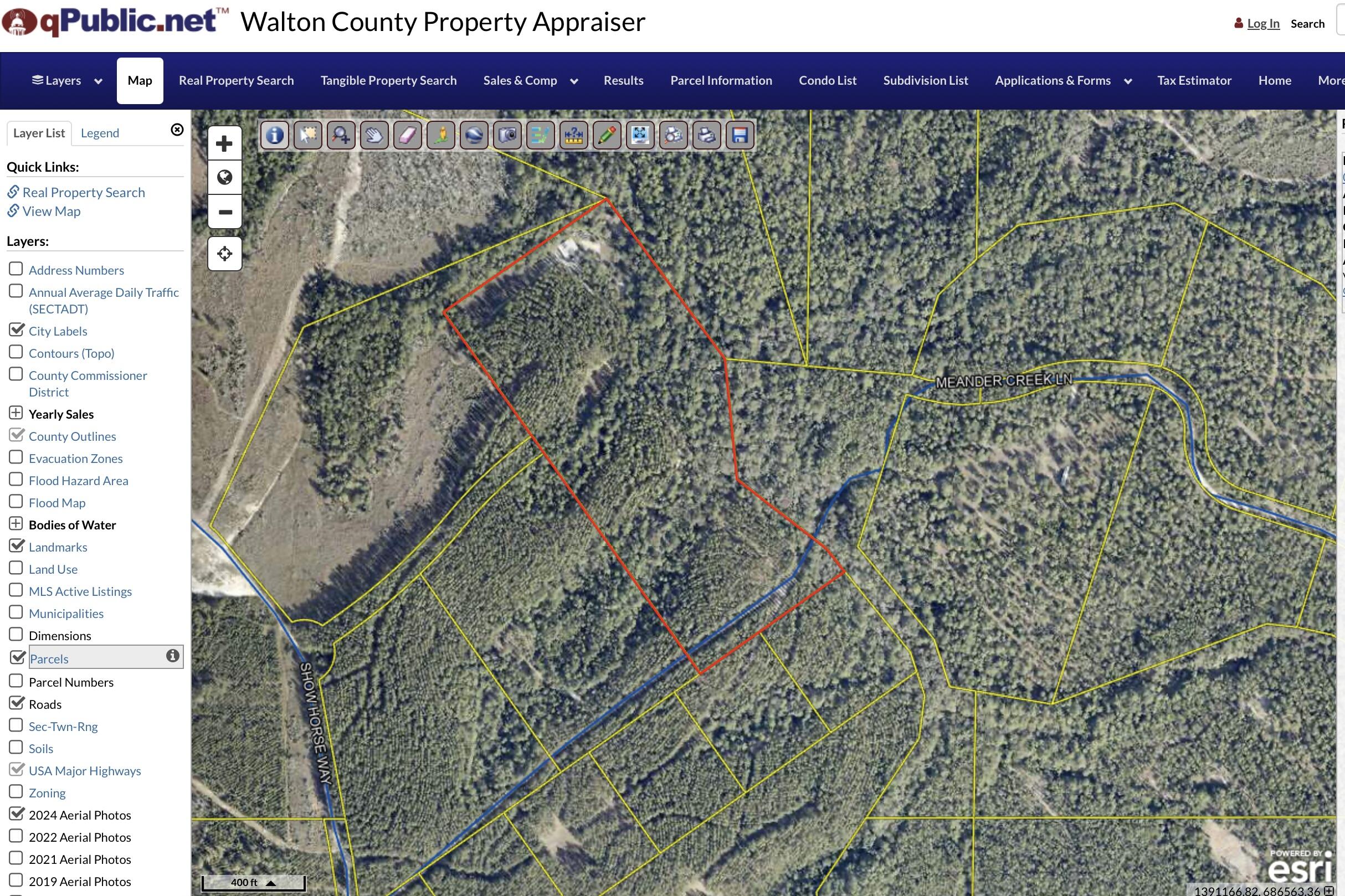 25 acres of pure escape! This retreat already has so much to offer. The north property line follows meander creek for the full length of the property. (about 1800 feet of creek frontage). The established winding road leading from the front of the property will give you a relaxed scenic tour of the  magnolia groves, winding creek, open fields and charming pine rows, as you follow the path to the back of the property. There you will find the 48'x60' poll barn with its full concrete slab. You'll see the off grid solar array that provides ample power for your camper necessities, as well as the water pump from the creek for irrigation and those wash down needs after a fun day on the mini-bikes.  What else could you ask for on your off grid retreat. Oh did you say maybe a tractor with a mower attachments and other implements to help with property maintenance.
Well, that's pretty specific, but you're in luck, because the property does come with a Kubota tractor with all the implements you mentioned above. But wait, there's more! How about 4 mini-bikes for your family to enjoy? Done...but thats all, don't ask for more, enough is enough. 