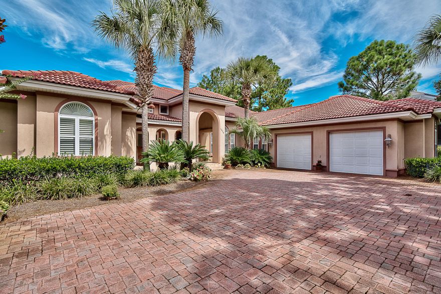 Located in the popular Island Green neighborhood of Sandestin, surrounded by lush golf course greens and stately magnolias, this custom home is waiting to be discovered by you. Overlooking the 5th Fairway of the Raven golf course, this well-kept 3 bedroom, 4.5 bath lake front home offers the appointments and features you would expect in a Sandestin luxury home. The planked oak flooring throughout the main living areas add warmth to the spacious and open floorplan. Key features of this home that are sure to please include an instant hot water system, a well -appointed kitchen with an abundance of custom cabinets, granite counter tops and top of the line appliances. The heart of the home opens into a family room with fireplace and a wall of built ins.