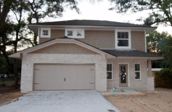 Brand new construction started on 8/15/2016. Awesome plan offered by a multiple award winning builder. This 2 Story (master is on first floor), 3/3.5 home has super curb appeal. There are 9 ft. ceilings w/ impressive crown molding, and 5 1/4'' baseboard throughout the main living areas and master. As you approach the front of the home, you will be quite impressed. The covered porch is very welcoming, and the attractive leaded glass door makes for a grand entrance. The formal dining room is at the left of the home's front. As you continue down the hallway, just past the stairwell, you will then enter the chef's delight kitchen which boasts maple cabinetry,custom cabinetry with crown moulding and plant ledges, 3 cm. granite countertops, Frigidaire Gallery series stainless appliances {including a commercial grade refrigerator/ freezer),and roomy breakfast bar. 9 Ft. ceilings, impressive crown moulding, and custom milled window and door casings are throughout the main floor. The first floor master suite is huge, has 2 walk - in closets, a double vanity, whirlpool garden tub and separate shower with glass enclosure. There are two A/C units. The additional 2 bedrooms are located on the second story, and each has a full bath. Insurance will be very reasonable, as home is built to today's code. Home has a "Taexx'', in the wall' pest control system, that is serviced from the exterior of the home, for owner's convenience. Yard will be fully fenced and beautifully landscaped, and comes complete with a sprinkler system, well, pump and timer. Area is very convenient to both bases, shopping, restaurants and 10 minutes from beaches.