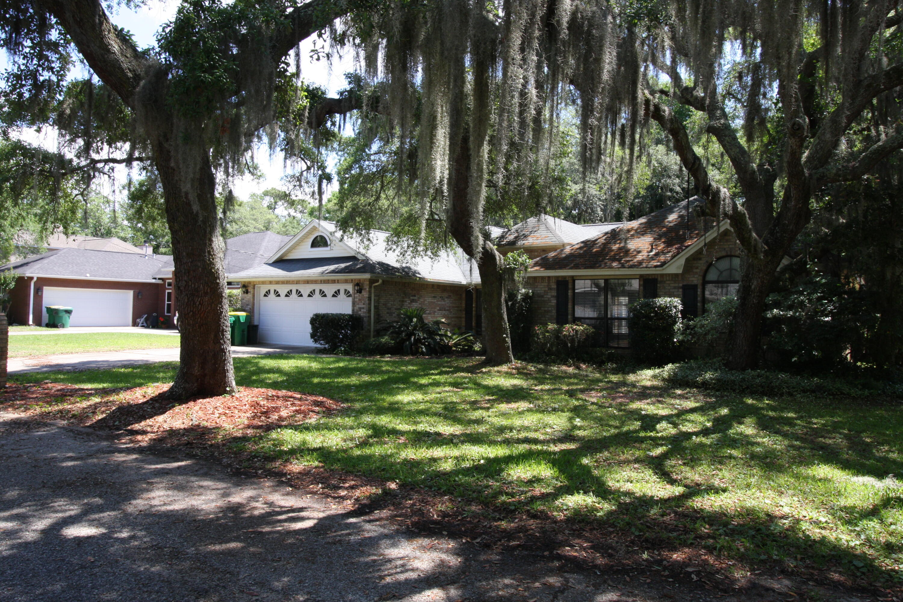 Immaculate brick HOME on a private street, one block from Santa Rosa Sound. Huge backyard, plenty of parking (2 car garage), freshly painted with new carpet in the bedrooms. Conveniently located to Hurlburt Field (10 mins/4 miles), Eglin AFB (20 mins/ 10 miles), Duke Field (40 mins/ 27 miles), dining, shopping, hospitals and the beach!! This beautiful 4bed / 2 bath home has a spilt floor plan, an office, screened in back porch, 2 living spaces, and a rubber mulched playground in the shaded, grassy back yard. Efficient appliances: gas fireplace, water heater and furnace, plus a washer and dryer. Nice Landlords!!
