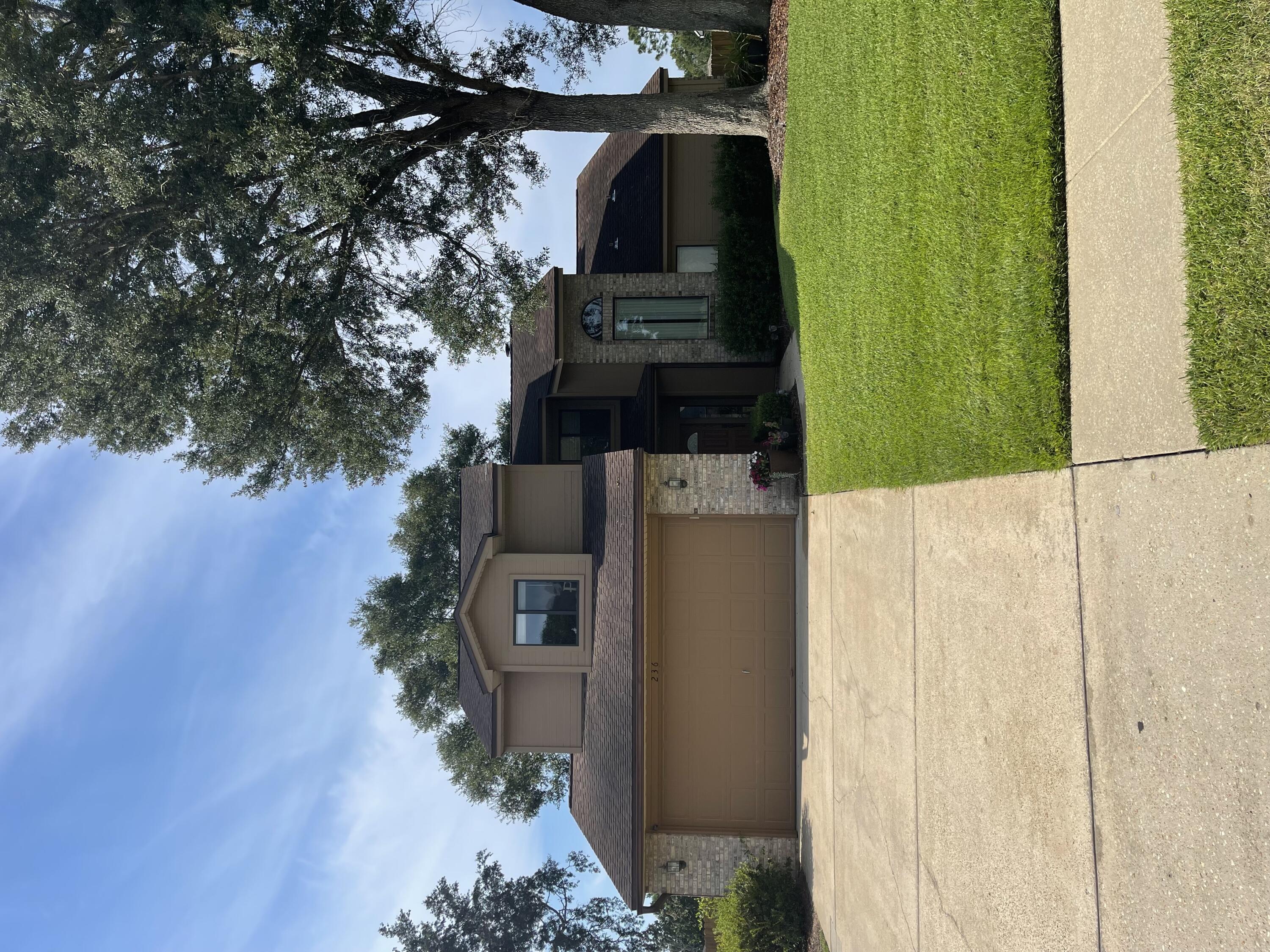 Wonderful opportunity to own in the desired Rocky Bayou area at Rockywood. This gem has a lot to offer. We invite you to come see this one in person it is worth the time! Living room features vaulted ceiling with plenty of natural light giving you the open airy feel. First floor master is spacious & offers a well sized on suite bathroom. The floor to ceiling fireplace is a great accent for the living room & nice focal piece.This home features a well sized & manicured lawn with a fenced in back yard. The Florida room is great for a gathering spot or flexible to make a great office space. Centrally located to shopping, restaurants & schools. The 2nd floor bedrooms are well sized & the shared bathroom has dual vanity. Additional half bath on first floor. Call for more information.