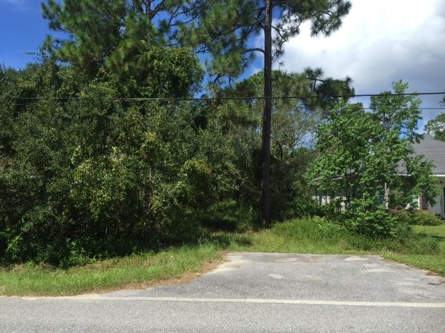 Build your own home on this lot conveniently located within minutes of the Mid Bay Bridge and Bluewater Bay.