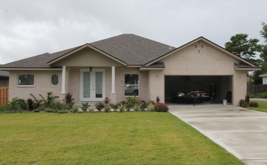 Entered for comps. only. Sold before listed. Room sizes are of a similar home Welcome to Temple Park, a 40 lot development is Shalimar with both underground utilities and large sidewalks. This 3/2 custom brick home has super curb appeal. There are 10 Ft. ceilings w/ impressive crown molding, LVP flooring throughout the main living areas, tile in baths, and 5 1/4'' baseboard throughout. The chef's delight kitchen boasts custom painted gray cabinetry, granite countertops, a large pantry, and stainless appliances (including an oversized commercial grade refrigerator/ freezer).