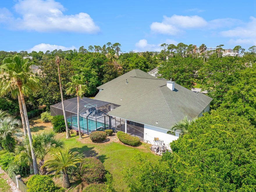 Aggressively priced and ready for you to make this house in the Fairways at Bay Point your next home!  Built and LIVED IN by Ledman, a premier and high-end builder in Bay County, you have strong bones to update the interior and 10 foot ceilings with your cosmetic preferences.  The roof and pool lanai were replaced in 2019, and the home is equipped with a 20kwh Cummings generator.  In addition to a two-car garage, a rare attached and insulated RV garage provides over 40 feet of extra storage depth.  Outside, the screened in pool and backyard on this almost half acre lot overlook the 12th Fairway of the acclaimed Nicklaus Course of Bay Point Golf Club. Inside, the living space and kitchen flow seamlessly together in an open concept with high ceilings that offers a kitchen island, formal dining area, and space for an eat-in kitchen table or option to place a fixed kitchen island for more counter space. The three bedrooms are located on the north wing of the house. The master suite has two walk-in closets that flank the king sized bed, and the sizable master bathroom has an additional door which opens directly to the pool deck, allowing for a simple rinse-off after a day by the pool.

The Bay Point community is one of the most beloved communities in Panama City Beach due to its close proximity to all the shopping and employment opportunities on both the east and west side of the Hathaway Bridge and West Bay. Bay Point itself offers golfing, tennis, pickleball, waterfront boardwalk, and dining options within the community. The Marina is an impressive community feature, with over 100 boat slips and a boat ramp for marina members, as well as a dockside pool for those wishing to cool off after a day on the water. Shell Island and the white sand beaches of St. Andrews State Park are just a short boat ride away.

Within Bay Point, Fairways is a highly desired neighborhood. Because of the location along the golf course, gated entrance, large lots, and limited availability, those who purchase a home in Fairways usually stay for a long time. Give us a call today to arrange your private showing, and you'll see why locals rave about Fairways in Bay Point.