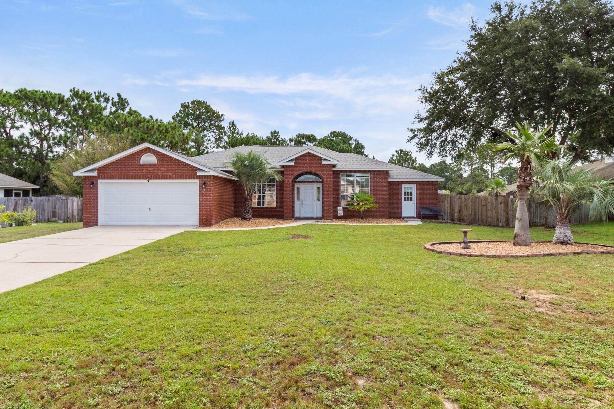 Renovated, Move-In Ready & Fully Fenced!Welcome to your beautifully updated 4-bedroom, 2-bath home, perfectly situated in a peaceful Navarre neighborhood just minutes from top-rated schools, shopping, and the sugar-white sands of the Gulf Coast. This move-in ready gem features a long list of recent upgrades, Fully renovated kitchen and bathrooms (2025)Fresh interior paint throughoutAll new carpet and flooring (2024)New hot water heater (2024)New roof (2022) for added peace of mindThe functional split floor plan provides both privacy and flexibility, while the fully fenced backyard is ideal for pets, kids, or entertaining guests.As part of the desirable Holley by the Sea community, you'll enjoy resort-style amenities. 3 pools, Basketball, tennis courts and gym.