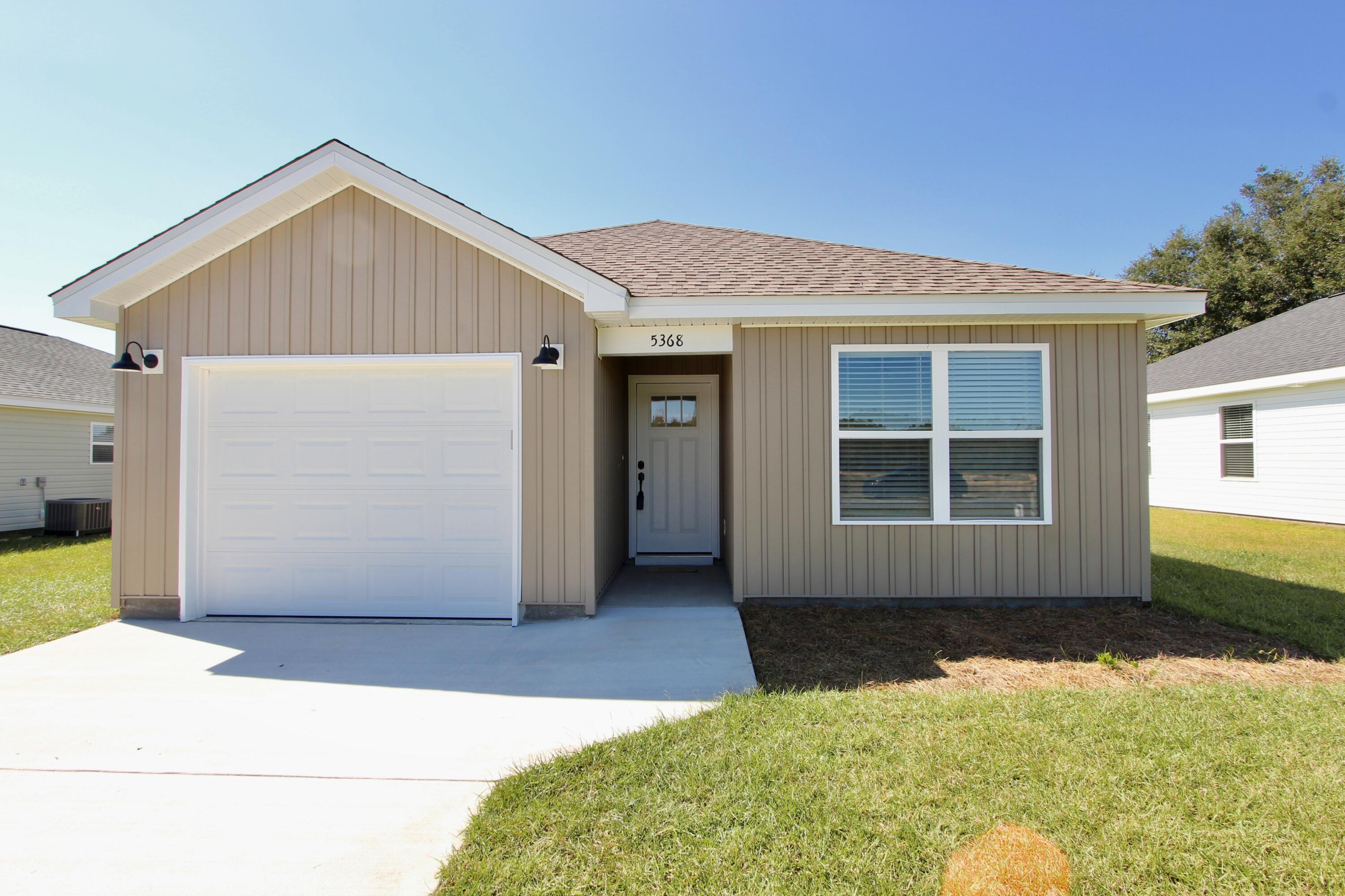 Welcome to the desirable Holley Grove Subdivision, where modern comfort meets suburban charm! This gem offers 2 bedrooms, 2 bathrooms, and a host of luxurious features. This home promises to be a haven of relaxation and style. From the moment you step inside, you'll be greeted by the sleek elegance of luxury vinyl plank (LVP) flooring, seamlessly flowing throughout the entire home. The heart of the home is the stunning kitchen, adorned with granite or quartz countertops and complemented by a beautiful tile backsplash. Picture yourself preparing meals with ease on the spacious island, with the added convenience of an under-mount sink and stainless steel appliances. The open floor plan creates a welcoming atmosphere, perfect, for entertaining guests or simply enjoying day-to-day living. Natural light floods the space, highlighting every detail of this thoughtfully designed home. Rest easy knowing that blinds come standard, offering privacy and style with a simple touch. The garage isn't forgotten either, with epoxy floors adding durability and a touch of sophistication. Residents of Holley Grove enjoy the perks of fiber internet throughout the neighborhood, ensuring lightning-fast connectivity for work or leisure. Plus, with no HOA fees, you have the freedom to customize your living experience to suit your preferences. Don't miss your chance to make this stunning home yours and experience the best of modern living in the heart of Holley Grove! Lender credit of $1,500 and Homes for Heroes credit (Qualifying Heroes are Military, Law Enforcement, Medical Professionals, Fire Fighters and Teachers) $1,000.00. Pictures are from a previously built home.