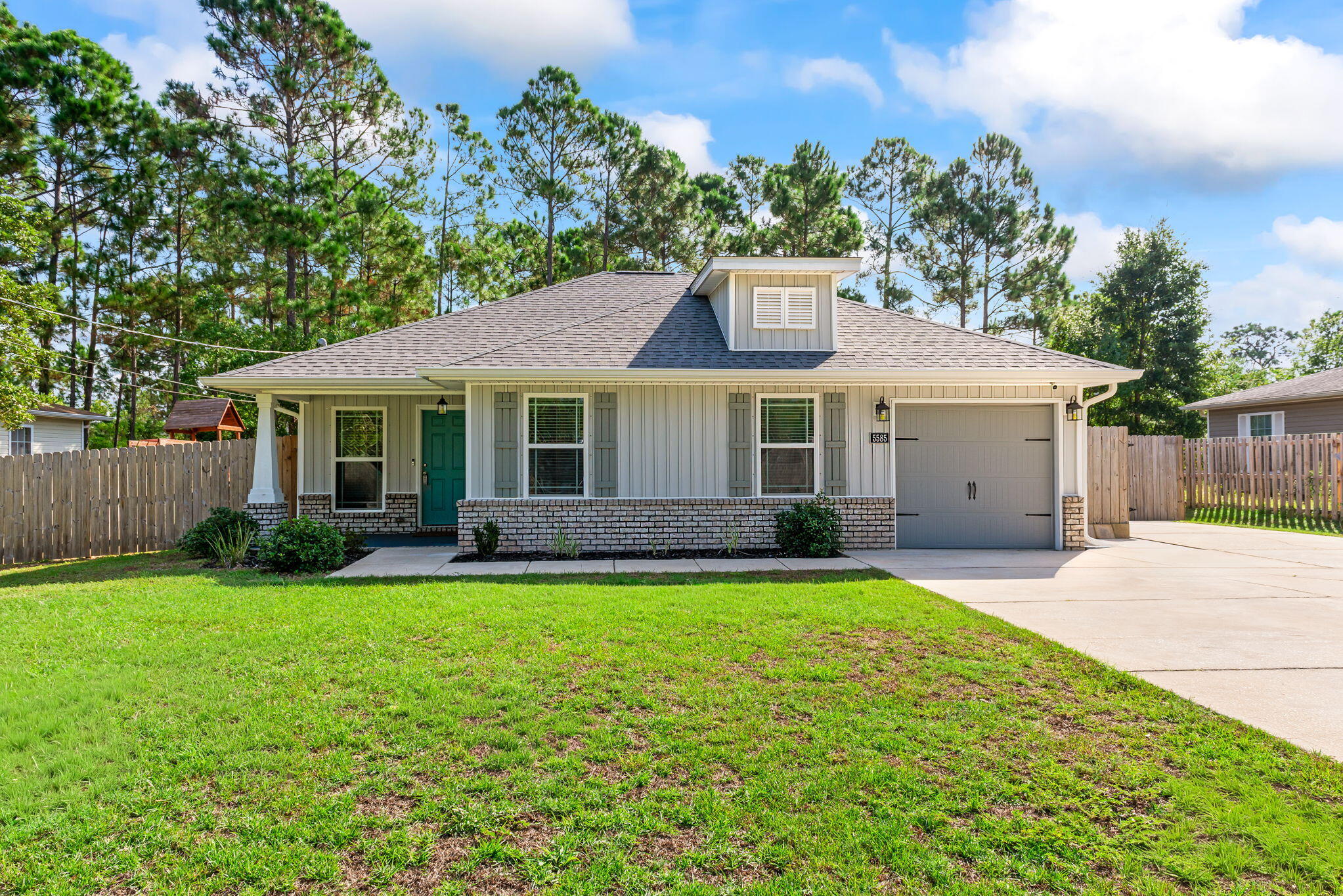 Don't miss out on this charming, one-owner home that's perfect for first-time buyers or those looking to downsize into a low-maintenance retreat Built in 2020 by the highly regarded Flynn Building Specialist, this residence blends modern construction with thoughtful design. This home sits just behind the brand-new Soundside High School, scheduled to open in Fall 2026, and only about 8 miles from the sugar-white sands of Navarre Beach, offering both convenience and coastal living. Featuring 3 spacious bedrooms and 2 full bathrooms, this home provides a functional layout with style and comfort in mind. The open-concept floor plan creates a seamless flow between the living, dining, and kitchen areas, making it ideal for entertaining or everyday living. Luxury vinyl plank flooring throughout