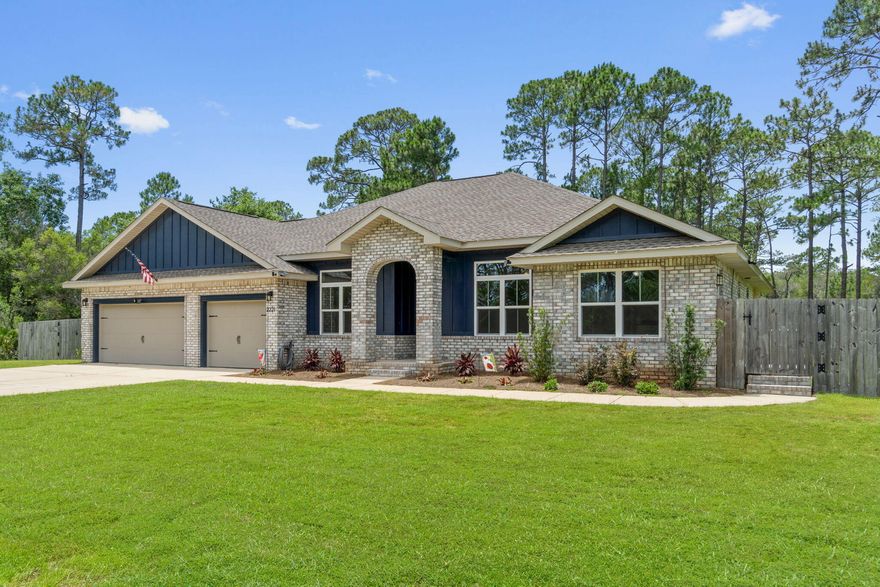Welcome Home to your Modern Craftsman Custom Built Home in Holley By The Sea offering a 4 BEDROOM / 3 FULL BATH split floor plan. Just four-years young with all those new homes touches done for you. Need a mother-in-Law suite or guest quarters ~ look no further ~This home has it all to offer and is exquisite inside and out  .....Owner's relocation is your dream situation to jump in on this true turnkey home. Gorgeous tile flooring through the main living areas ~ Craftsman kitchen with staggered shaker cabinets, granite countertops S/S appliances and & large center Island with sleek top breakfast bar~ yard is fully fenced and enhanced by the covered porch to sit out and enjoy those wonderful Florida evenings ... Situated in the sought-after community of Holley By The Sea, enjoying all the Club House amenities including :Pools, Fully Equipped Gym, Tennis Courts, Waterfront Park & Deeded Access to Santa Rosa Sound Great Location within HBTS wrapped by a conservation area ~with easy access to Navarre Beach, shopping and Hwy 98 to Hurlburt Field AFB. This Stunning Robbins Builders Custom Home offers trend setting design & features~Greeted by a walk-in foyer open to the Formal Dining and Office through to your open floor plan.
Wood Plank staggered tile through the foyer, dining room, main living area, laundry and bathrooms. Large Master with trey ceiling & ceiling fan. Master bath offers a large, tiled walk-in shower /separate soaking tub, granite double vanity with picture frame mirrors & Huge Walk-in closet. First additional bedroom is a great size with a double closet and its own bathroom with a step-in tub/shower, linen closet and WC. Second bedroom is off the additional hallway and has a double closet. Third additional bedroom would make a perfect guest/mother-in-law suite with the bedroom open to a sitting area with built in kitchenette area offering built in cabinets, sink, worktop and space for a fridge. This Guest annex has a separate entrance at the side of the home and access to a full bathroom. Deep laundry room is access to the oversized 3 car garage ...ideal for the larger trucks and still plenty of room for all the outdoor toys. Home is situated on a large lot with grassed yard ~sprinkler system~ lawn pump and well with digital programmable timer for easy care. TAEXX in wall pest control system~ Fabric Shield Hurricane protection and dimensional shingle roof for lower insurance premium. Upgrades include crown molding, recessed lighting, framed mirrors, deluxe lighting package,50 Gallon water heater, garage door remotes, attic drop down stairs~ to name a few......Call today to arrange your viewing of this unique family home.

