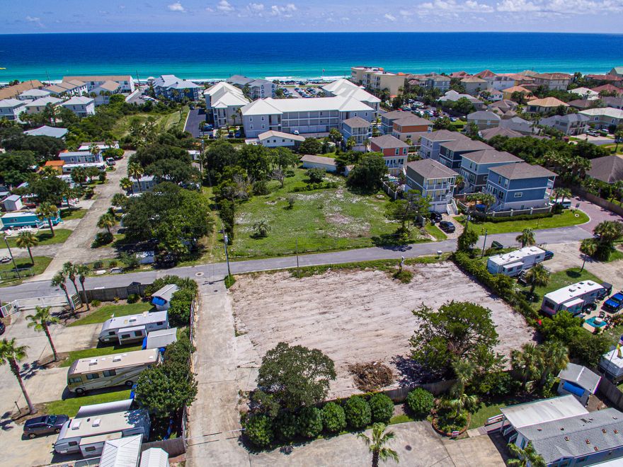 Get your golf cart ready! It is time to buy at the beach! Do not miss out on this beautiful, cleared lot just a block from the beach! This lot is priced to sell quickly so bring your best offer. NO HOA! Seller is a builder and will be building a custom home on the lot next door.