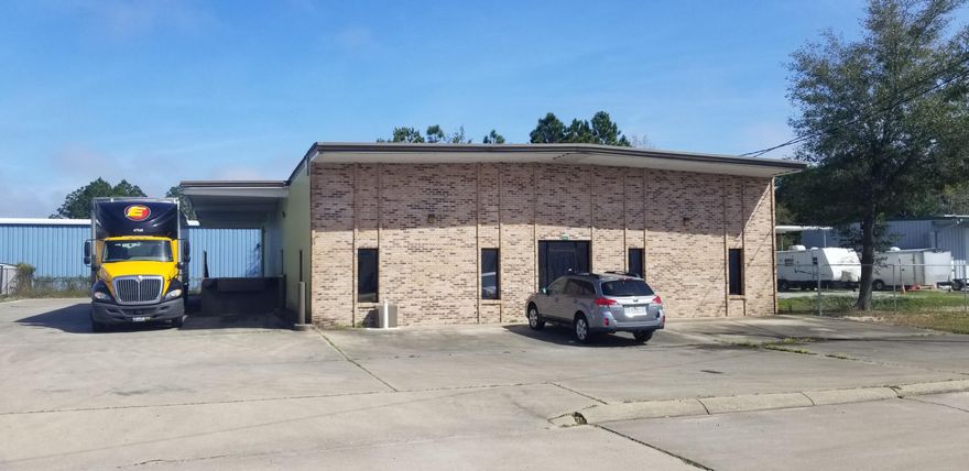 Nice warehouse/office with above ground loading dock, lease term flexible. About 1/2 of building is office. Has rollup door on side at loading ramp. This is a sublease and existing tenant needs 7-10 days to vacate.