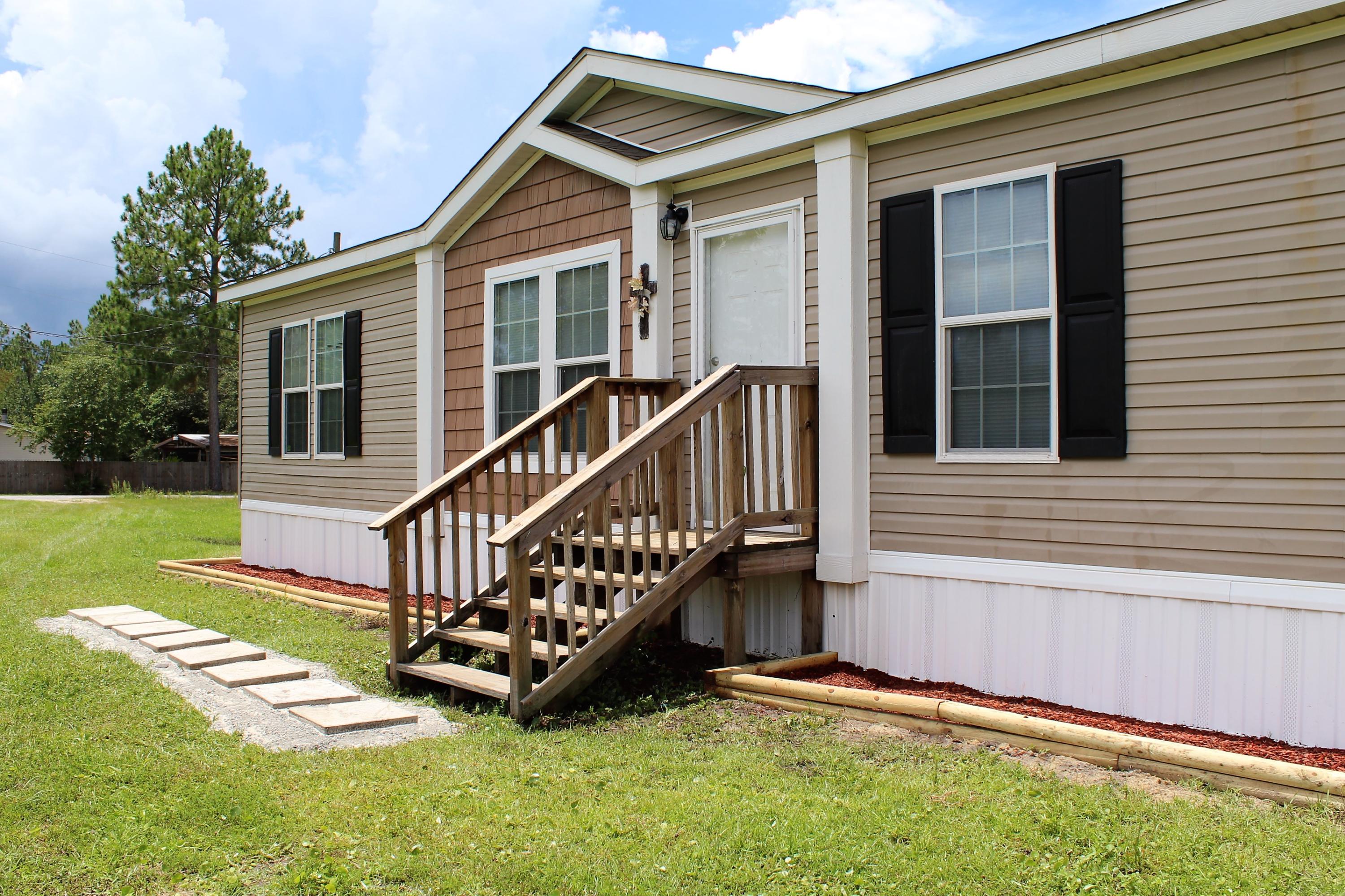 Welcome home! This spacious place has plenty of extras ~ 1566sf with an open kitchen, wood-look vinyl flooring, breakfast bar, 2 living spaces, fireplace, and garden tub. Set on a 1-1/2 acre lot with wide open space and plenty of green grass. *SELLER FINANCING AVAILABLE**all measurements approximate, buyer to verify*
