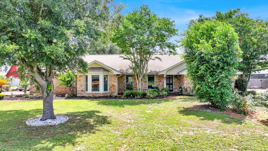 Kings Point, this stunning 4-bedroom, 2-bath all-brick home is full of charm and upgrades. Situated on a generous half-acre lot (No flood zone) with no HOA, it features a beautifully repainted gunite pool deck, lush landscaping, and fruit trees including plum, orange, lemon, banana, and cherry.Step inside to a cathedral-ceiling great room with fresh paint, gleaming hardwood floors, and a cozy wood-burning fireplace--perfect for gathering with family and friends. The kitchen is a chef's delight with granite countertops, abundant cabinetry, a large pantry, a breakfast bar, and brand-new Samsung appliances. The bay-window breakfast nook, complete with a window seat, offers tranquil views of the expansive backyard and majestic oak tree A formal dining room provides the ideal space for entertaining.

The split-bedroom layout ensures privacy, with all bedrooms being impressively large and featuring walk-in closets. The master suite boasts its own cathedral ceiling, Patio door access to the pool, a massive walk-in closet, and a luxurious en suite bath with a clawfoot tub, separate tiled shower, double vanity, and private water closet.

Outside, enjoy the convenience of a 12x20 workshop, greenhouse, and dedicated garden area. The extra-long driveway allows for ample parking, and the 2-car garage is equipped with built-in cabinetsplus, the extra refrigerator stays!

Major systems have been updated: A/C (2018), roof, water softener, and garage door (2019), pool pump and thermostat (2025)ensuring peace of mind and move-in readiness.

Don't miss this rare opportunity to own a beautifully maintained pool home with space, style, and no HOA restrictions!