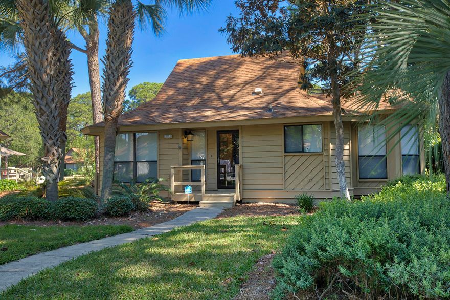 Don't miss your opportunity to view this quaint cedar sided cottage which
is located in the quiet Fairways neighborhood of Sandestin Resort. This never rented & updated 2BD/2BA is offered fully furnished. Latest improvements include complete exterior paint, interior painted, new light fixtures, new window treatments, crown molding, new ceiling fans, new hot water heater, all new furniture & decor throughout, huge extended outdoor deck over the lake freshly painted, and the largest adjacent outdoor storage room (10x10) in Fairways to store all your beach and bike stuff. Beautiful lakefront setting with this huge multi level deck located directly off the screened-in back porch for outdoor enjoyment. Majestic pines and lush foliage surround the cottage keeping the deck mostly shaded during the day. Sandestin Golf and Beach Resort  has been named the #1 resort on Florida' Emerald Coast. Encompasses over 2,000 acres with over 70 unique neighborhoods of condominiums, villas, town homes, and estates. The resort features the largest private beach in the area and pristine bay front, four championship golf courses, a world-class tennis center with 15 courts, 4 resort swimming pools (and 15 private neighborhood pools), world class marina, a fully equipped and professionally staffed fitness center and spa, and The Village of Baytowne Wharf with events, shopping, dining, & entertainment. Grand Boulevard is just outside the resort gates and provides access to additional shopping, dining and entertainment all accessible by golf cart. Wonderful family beach retreat and/or rental investment opportunity. Must see to truly appreciate.Call and schedule your viewing today and start enjoying the Sandestin lifestyle. Buyers or their Agents should confirm all information to their satisfaction.