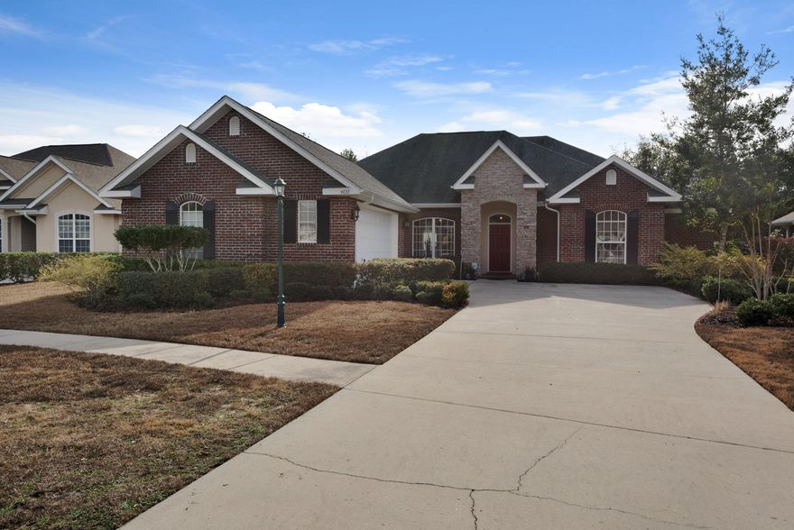 There's a secret inside Chanan Estates! Inside this gated community, you'll find a true ''Safe Home''. The Designer of this custom 4 BR/ 2 1/2 Bath made ''safety'' the focus. Not only did the Designer include a ''Safe Room'' inside the garage for storm protection, the Builder added extra rebar inside all exterior brick (ensuring this home could better withstand hurricane force winds). The team also installed a ''Hurricane Rated garage door, with it's own special locking mechanism (deep discounts for Home Owner's Insurance). The safety theme continues, with a top of the line security surveillance system; offering peace of mind protection. Step inside, and you'll find upgrades in most rooms. There are stately columns surrounding the Formal Living/ Dining Room and PREMIUM Pecan (CONTINUED).