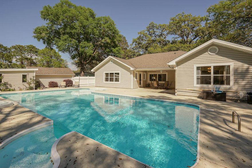 Come and enjoy an incredible Floridian home that combines a beautiful and serene view with an upgraded house, pool, and enormous entertaining yard! This home has been lived in and loved for many years, and it has been conscientiously updated including an enormous master bedroom and kitchen as well as new ducting, lighting, ceilings, walls, exterior and much more! This home is move in ready in an area that is seeing enormous growth and resurgence and is convenient to the best amenities Fort Walton has to offer by being able to access downtown or the yacht club via boat or venture to those as well as Ferry Park and Uptown Station via golf cart. However, the best part about owning this home are its beautiful sunset views and amazing times in the pool and on the water with family!