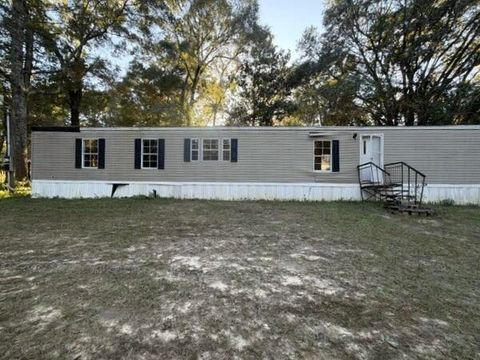 Photo of 555 Jacks Brach Road, Cantonment, FL 32533 (MLS # 988894)