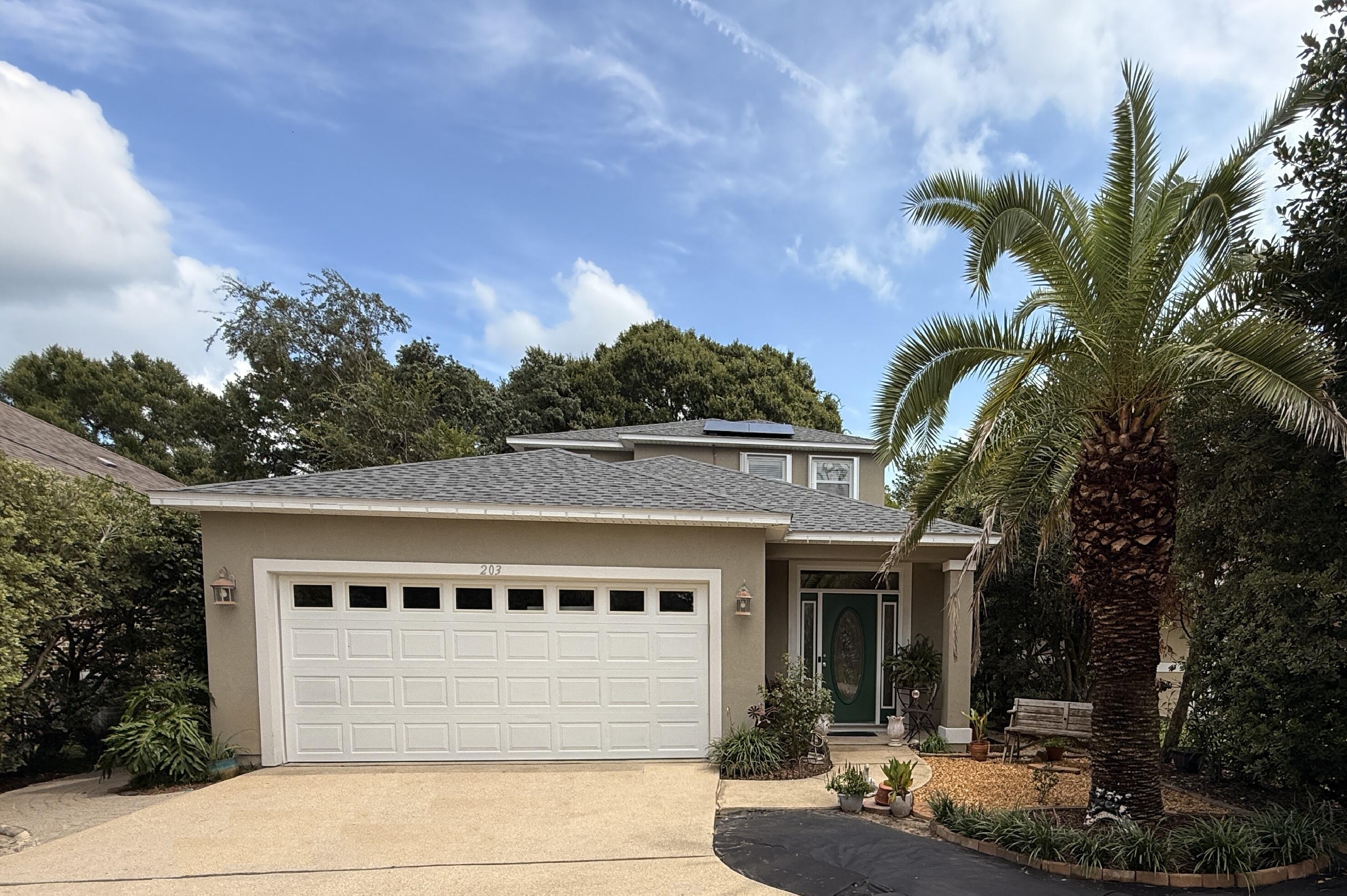You must see this well-loved 4-bedroom, 2.5-bath, 2,319 sq. ft. home in central Fort Walton Beach, perfectly situated near Hurlburt Field, Eglin AFB, and the 7th Special Forces Group. Built in 2006 and meticulously maintained, it offers great curb appeal with a lush lawn, smooth ceilings, and an inviting tiled foyer leading to a formal dining room and half bath for guests. The spacious kitchen boasts maple cabinets, updated stainless-steel appliances, Corian countertops, a large pantry, and a breakfast bar overlooking the living room with tiled floors and a cozy fireplace. The Master Bedroom is on the 1st Floor and has French Doors that open to the Back patio. The Master Bath has a Separate Shower, Jetted Tub, Double Vanity and a Walk-In Closet. Upstairs, there are 3 Additional Bedrooms, a Full Bath with Maple Cabinets, Faux Marble Countertop and Tub/Shower Combo. There are Two HVAC Systems to keep the home cool! The Back Patio is covered to maximize the enjoyment of the Peaceful Yard with Lawn Pump and Sprinkler System. You will find lovely landscaping in front, back and on both sides of the home. Inside the privacy fenced back yard, there is a large aluminum shed & plenty of room for Pets and Play. The Architectural/Dimensional Shingled Roof is less than a year old! The Garage fits two cars and has an automatic opener. The Driveway is very long with an extra turnabout that makes it easy to turn onto Beal. This move-in ready home has it all!