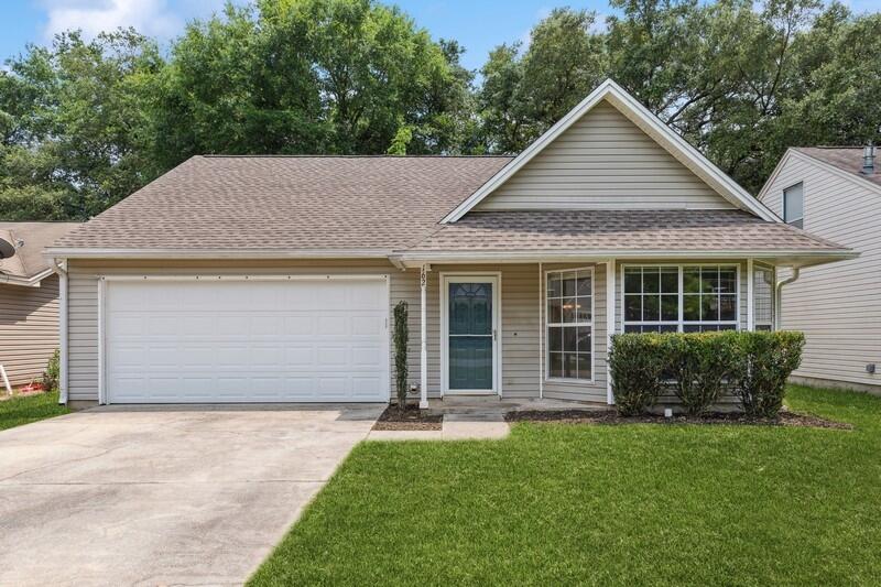 You'll love this thoughtful floorplan! Light and bright spacious living area welcomes you with luxury vinyl plank flooring, bay window, and vaulted ceiling. Enjoy meal prep with plenty of granite countertop and cabinet space and stainless appliance suite in your kitchen (2022 Bosch dishwasher and 2023 1/2 HP garbage disposal) with a sliding door to the fully fenced backyard. The primary suite will easily fit a king-sized bed, has an ensuite with dual vanity granite countertops and walk-in closet. Upstairs you'll find two bedrooms that share a full bathroom. Garage has cabinets with LED lighting for those DIY projects, attic storage, and hooks for your kayaks and bikes. Grill and chill on the open patio in the back. 2018 HVAC, 2018 Roof. This home is ready for you to make it yours!