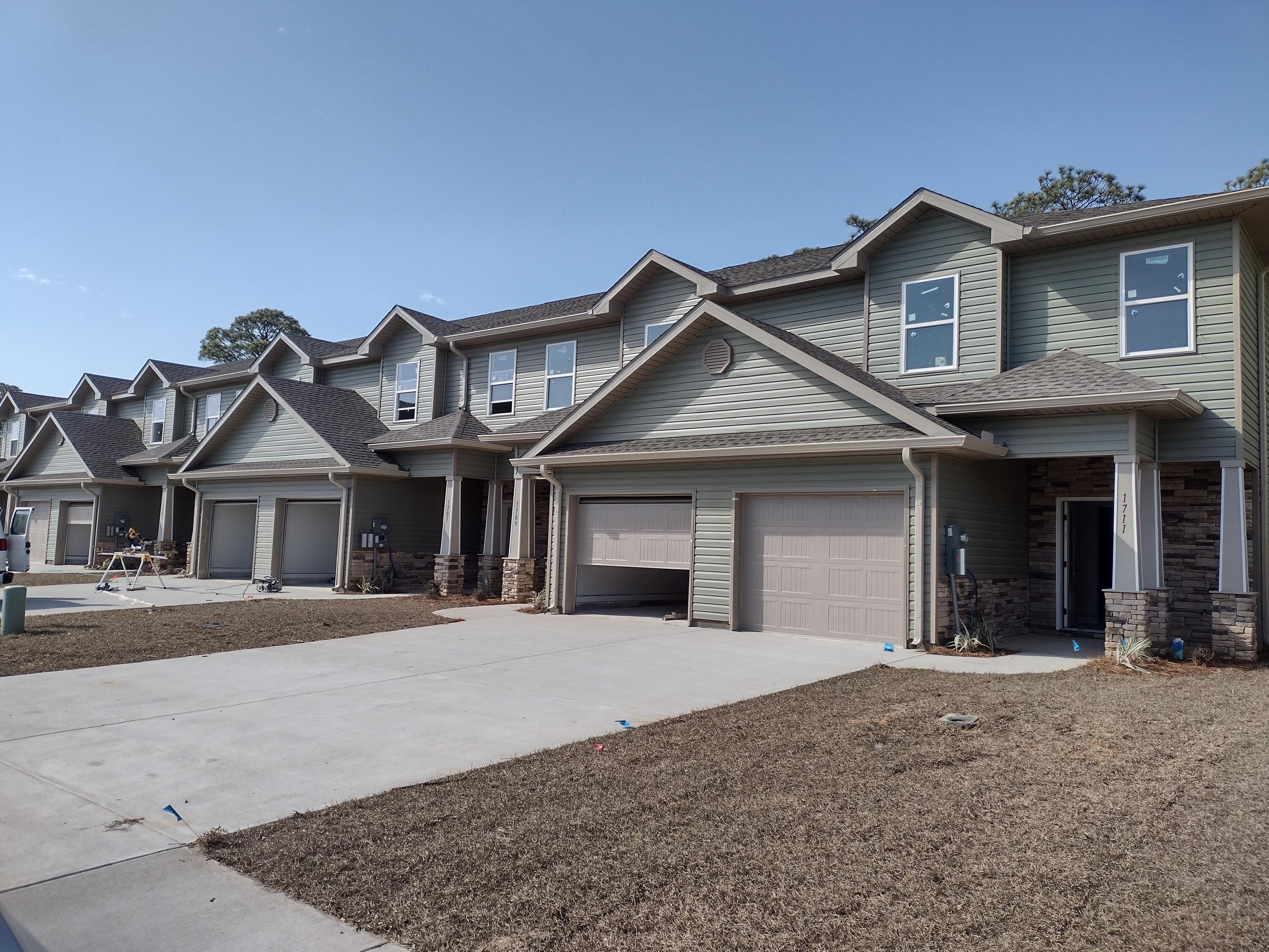The last 15 units to be built in this Luxury craftsman style townhome community!! Built to the latest building and energy codes helps both on insurance as well as power bills. The location is a short distance to Hurlburt, as well as Gulf Breeze. Navarre Beach and Pensacola Beach are short drives as are shopping, and dining options. The home features 3 well sized bedrooms, 2 full bathrooms and a powder room is located conveniently on the main floor. The main floor features an open floor plan. The kitchen features granite countertops, and stainless appliances. Luxury vinyl plank flooring is throughout the home, so cleanup is easy. Upstairs the master suite is located to the back of the home with large walk in closet and double sink vanity. Estimated completion Jan 2023