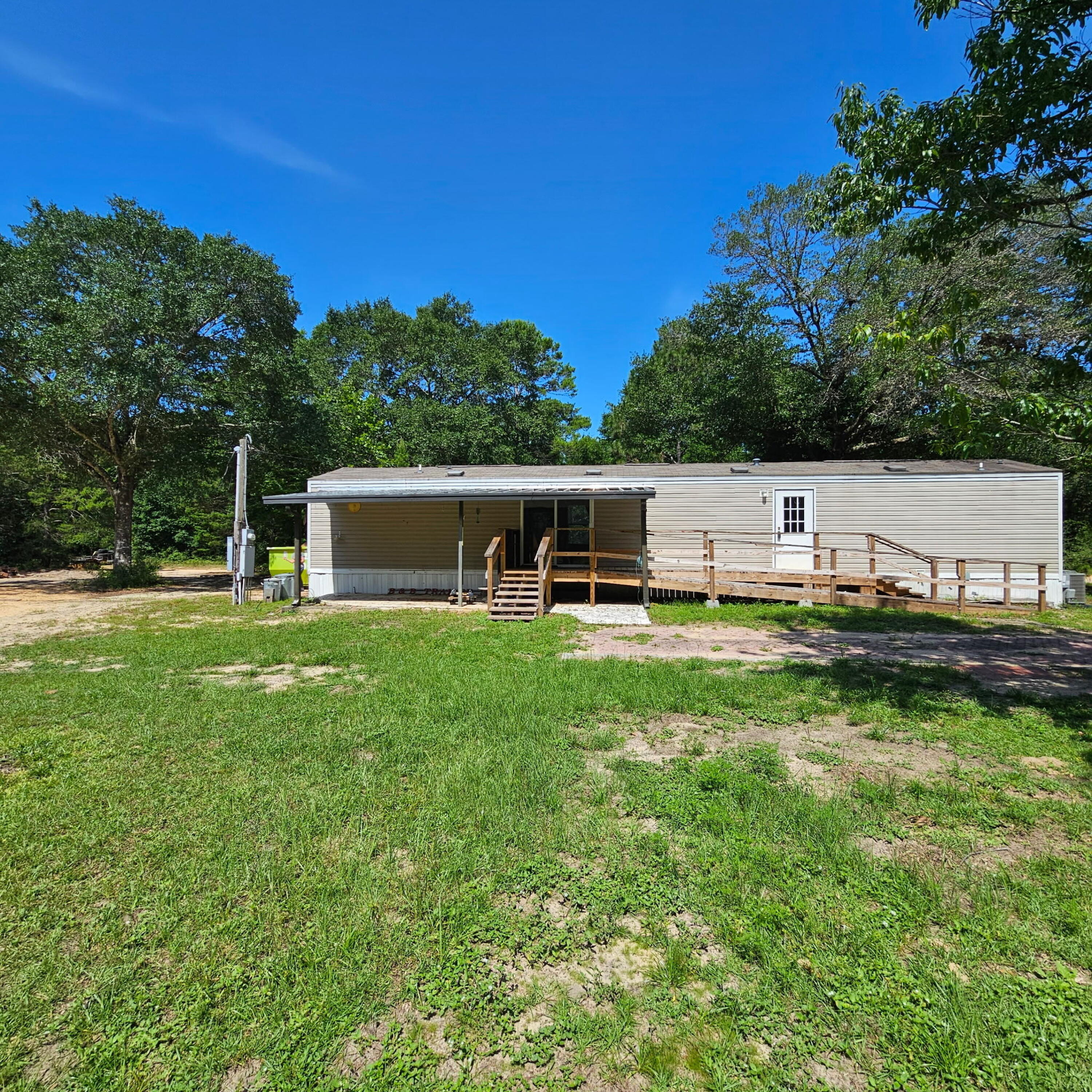 Endless Possibilities on 5.5 Acres - A Rare Find!Welcome to your own slice of paradise! Nestled on 5.5 sprawling acres, this unique property offers endless potential and is perfect for hobbyists, homesteaders, or anyone seeking space and versatility.At the heart of the property is a 2020 mobile home in excellent condition, featuring 2 bedrooms and 2 full bathrooms. The interior is clean and modern, with appliances that are like new--having been rarely used. Outside, the opportunities are truly limitless. Multiple outbuildings provide flexible storage and workspace options, while a large workshop includes a secured area for tools and equipment, along with ample covered workspace to suit any project or passion. A greenhouse adds to the property's charm and functionality, perfect for year-round gardening (needs some TLC). Whether you're looking to create a self-sustaining lifestyle, start a small business, or simply enjoy peaceful rural living, this property has it all.Don't miss your chance to make this versatile property yours!
** Estate Auction: Property is being prepped for auction - currently scheduled for June 7, 2025. Please DO NOT access the property without your realtor and use EXTREME CAUTION. Please do not enter any of the storage trailers.