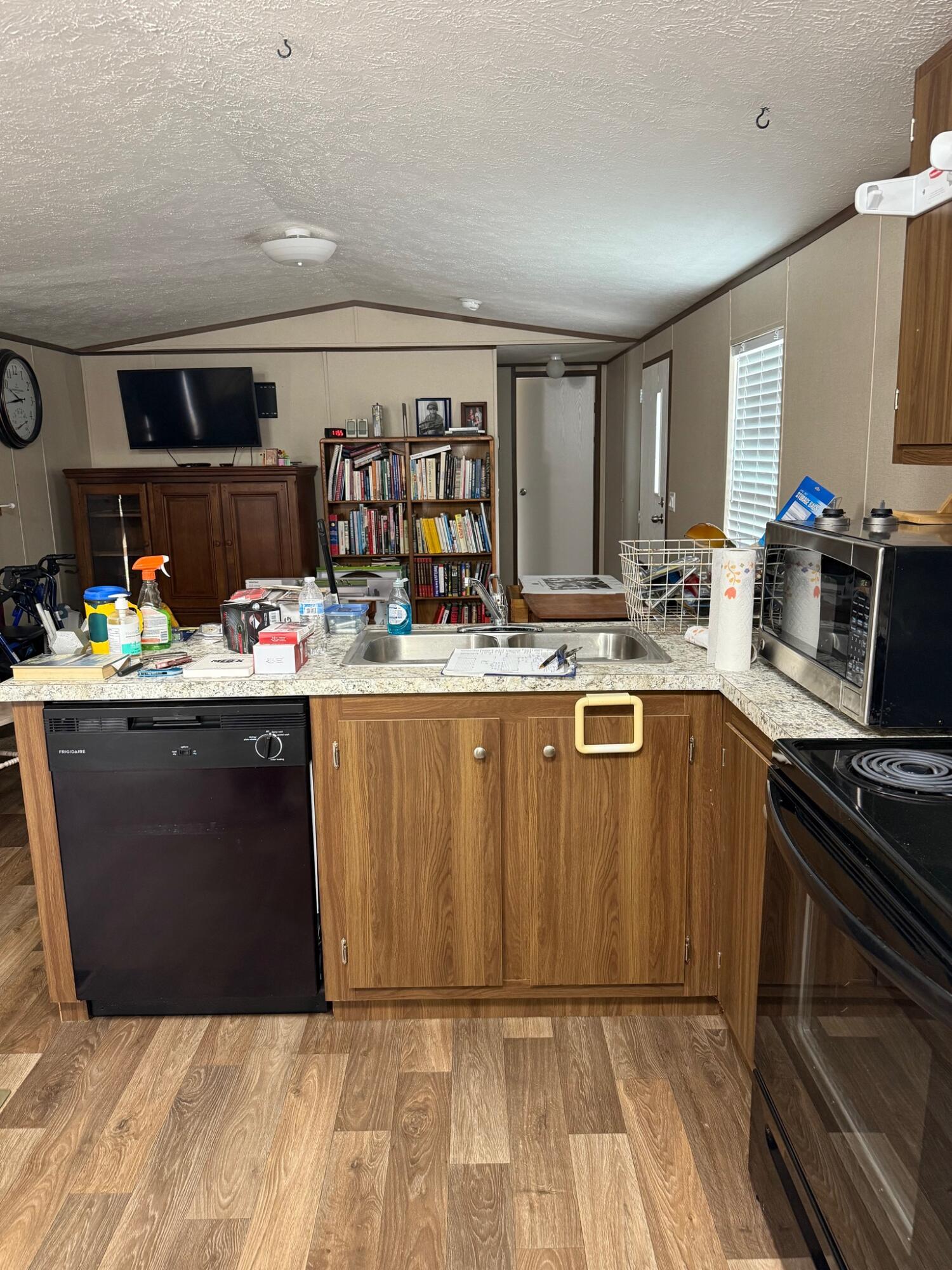 Endless Possibilities on 5.5 Acres - A Rare Find!Welcome to your own slice of paradise! Nestled on 5.5 sprawling acres, this unique property offers endless potential and is perfect for hobbyists, homesteaders, or anyone seeking space and versatility.At the heart of the property is a 2020 mobile home in excellent condition, featuring 2 bedrooms and 2 full bathrooms. The interior is clean and modern, with appliances that are like new--having been rarely used. Outside, the opportunities are truly limitless. Multiple outbuildings provide flexible storage and workspace options, while a large workshop includes a secured area for tools and equipment, along with ample covered workspace to suit any project or passion. A greenhouse adds to the property's charm and functionality, perfect for year-round gardening (needs some TLC). Whether you're looking to create a self-sustaining lifestyle, start a small business, or simply enjoy peaceful rural living, this property has it all.Don't miss your chance to make this versatile property yours!
** Estate Auction: Property is being prepped for auction - currently scheduled for June 7, 2025. Please DO NOT access the property without your realtor and use EXTREME CAUTION. Please do not enter any of the storage trailers.